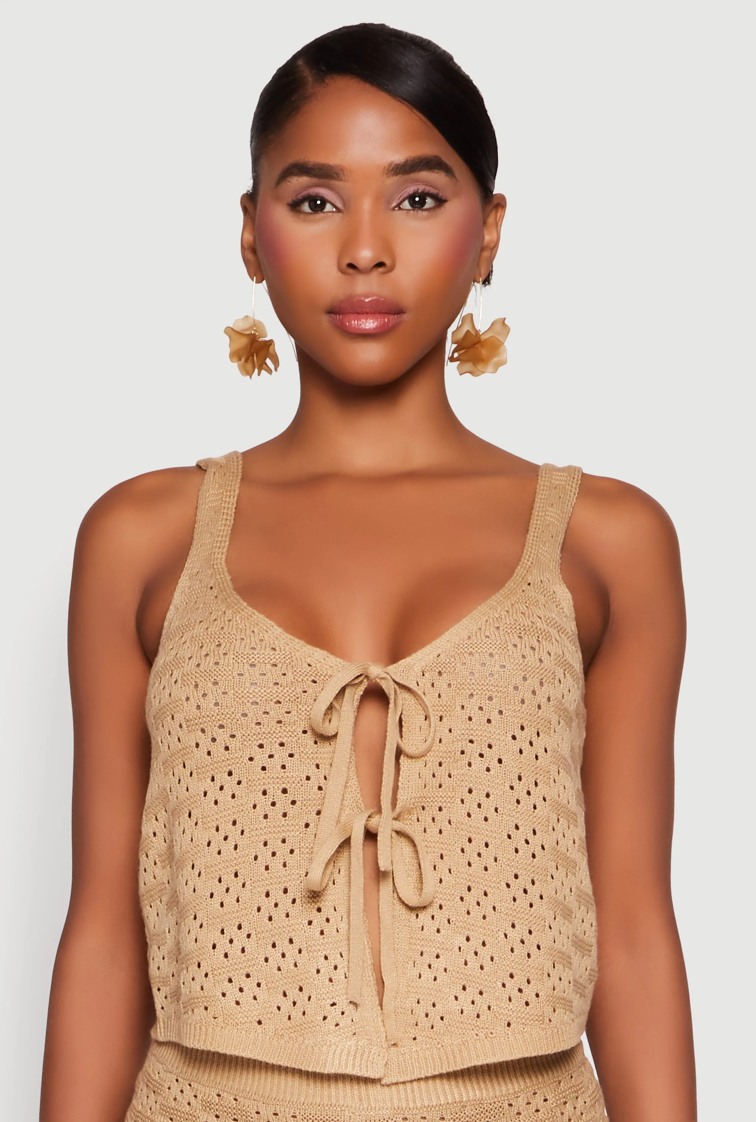 Almost Famous Pointelle Crochet Tie Front Top sold by Rainbow