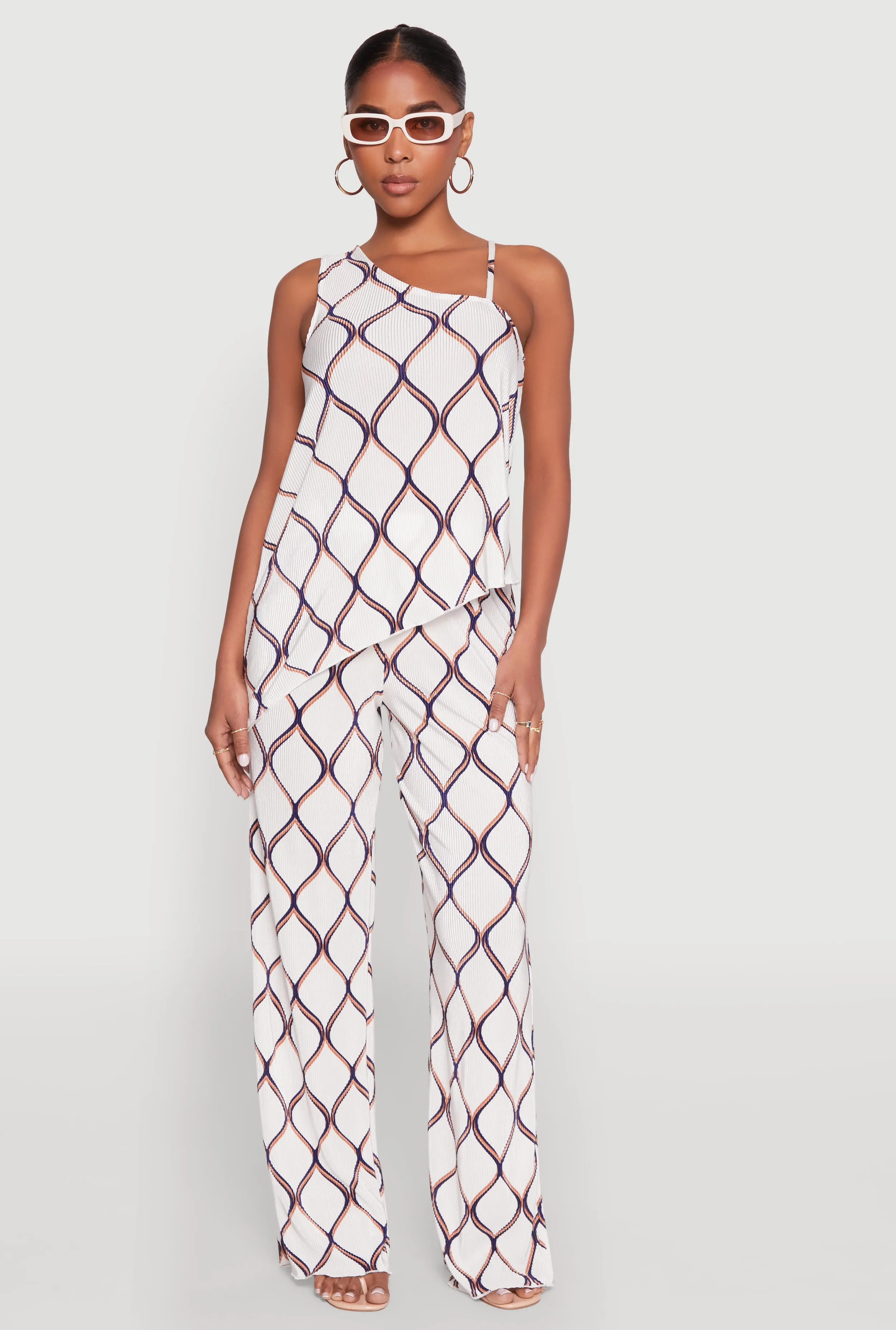 Almost Famous Plisse Asymmetrical Top sold by Rainbow product image thumbnail 3