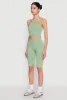 Criss Cross Caged Back Cropped Cami sold by Rainbow