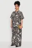 Plus Size Leaf Print Blouse sold by Rainbow