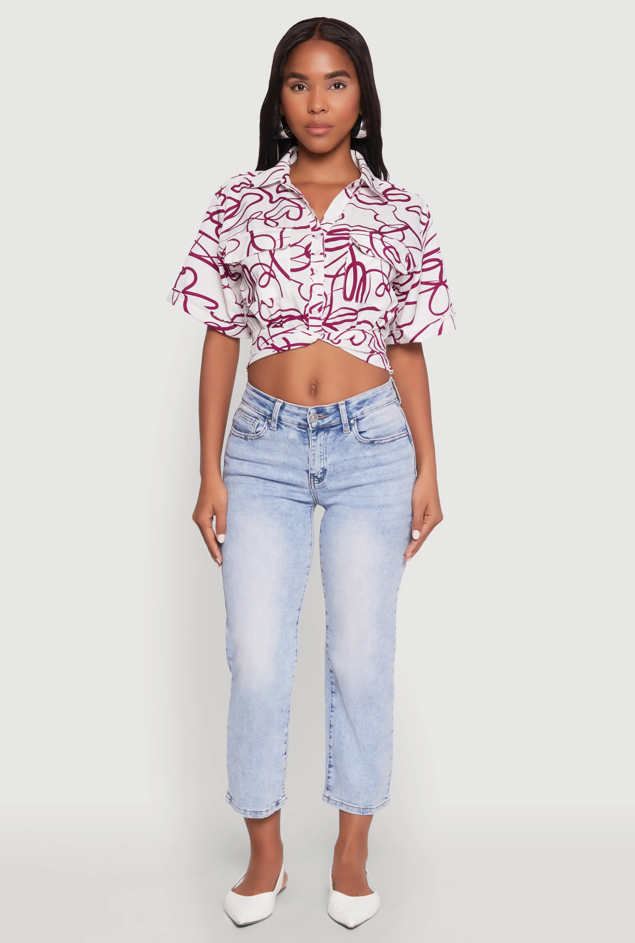 Twist Front Swirl Print Top sold by Rainbow