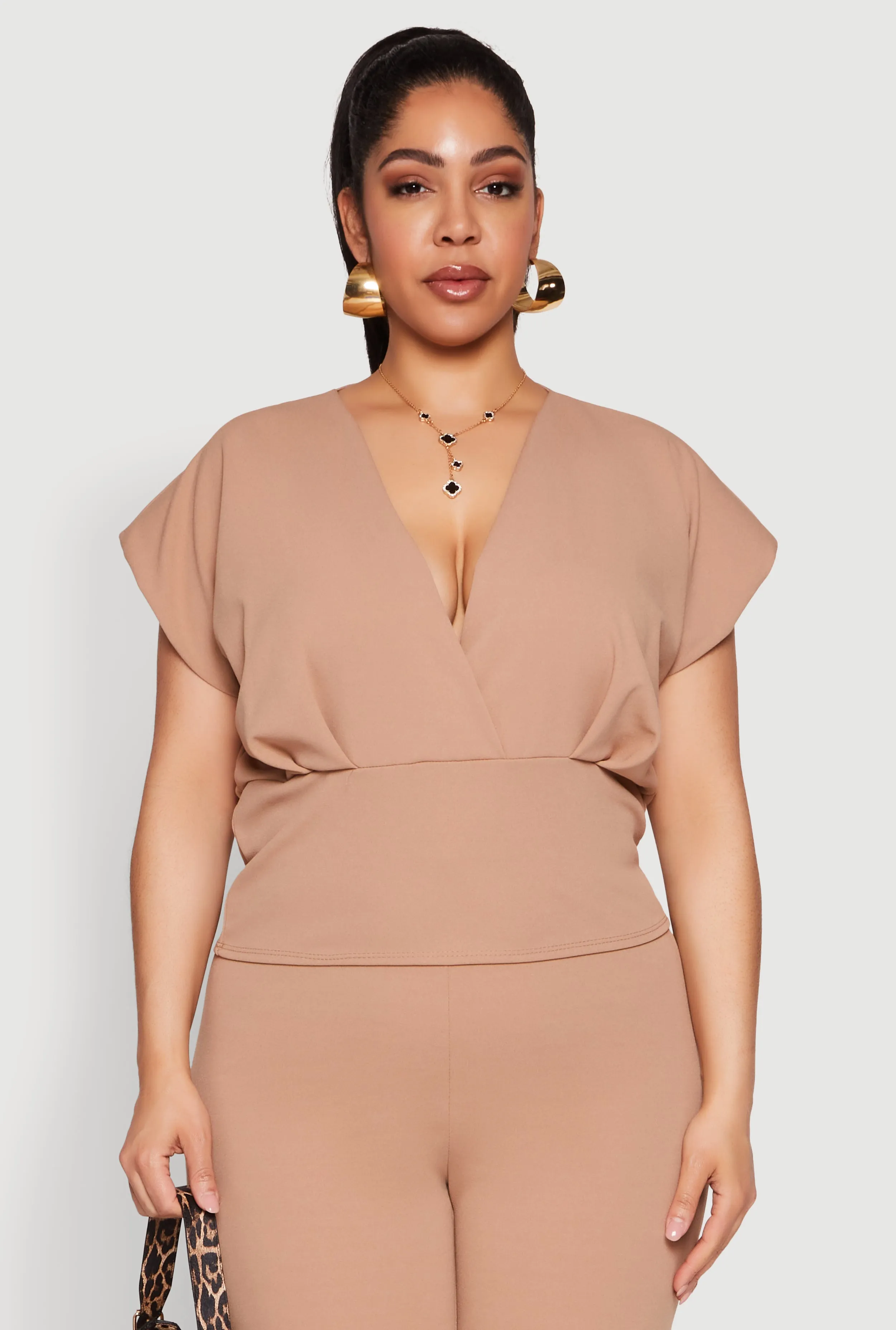 Plus Size Faux Wrap Top sold by Rainbow