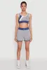 94 Graphic Denim Trim Crop Top sold by Rainbow