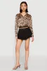 Crepe Knit Tiered Skort sold by Rainbow
