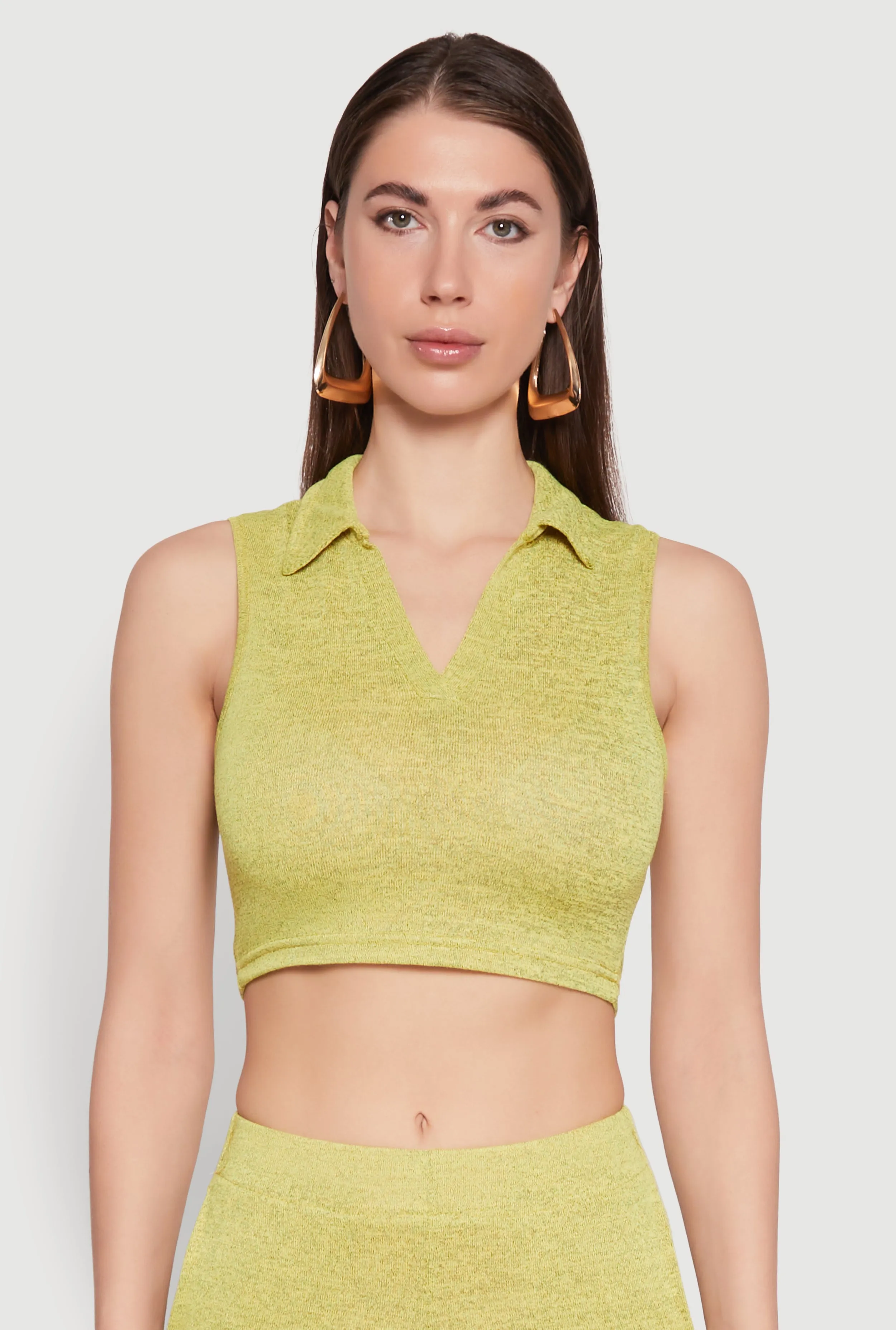 Daisy Sleeveless Collared Crop Top sold by Rainbow