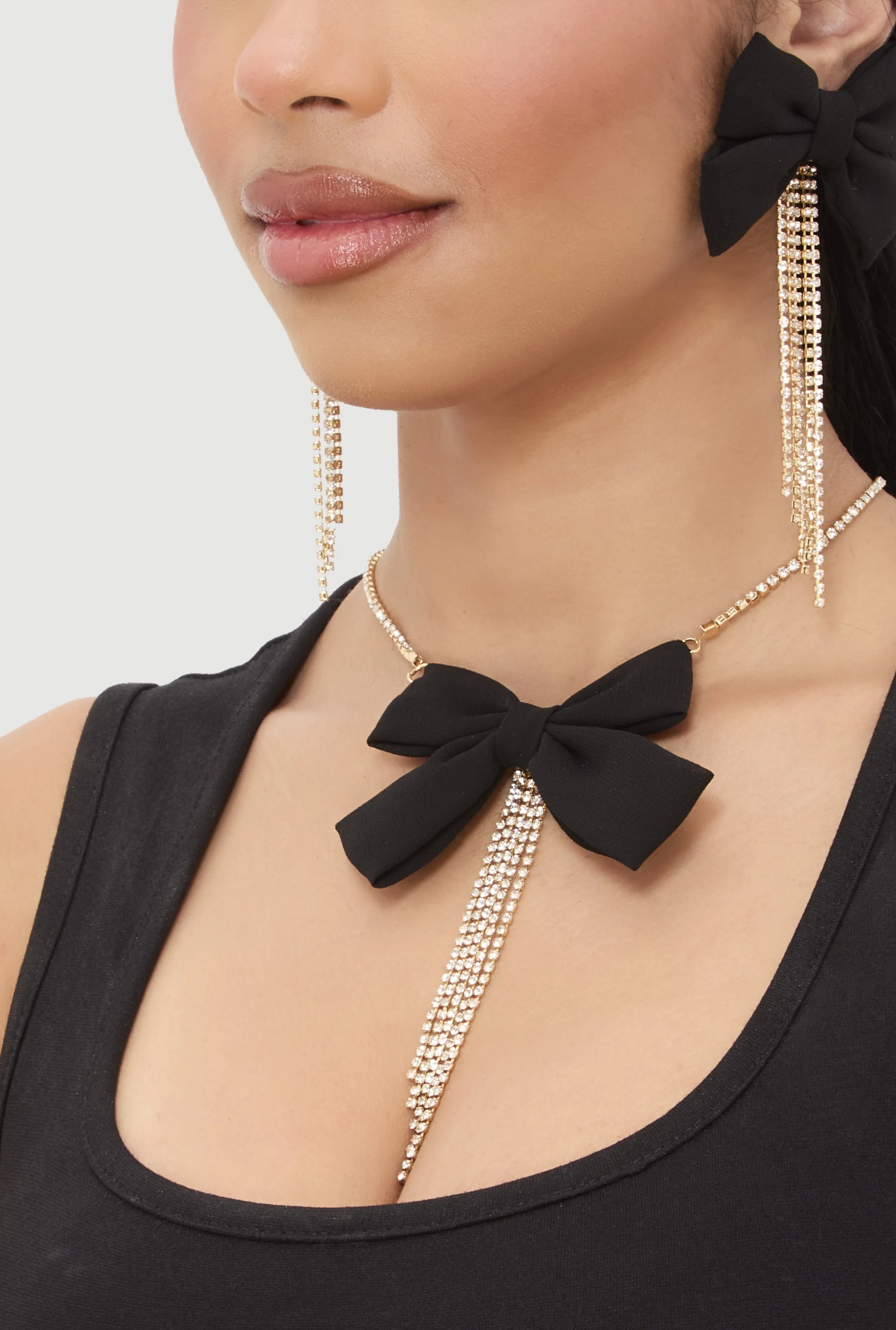 Bow Tassel Necklace and Drop Earrings Set sold by Rainbow product image thumbnail 2