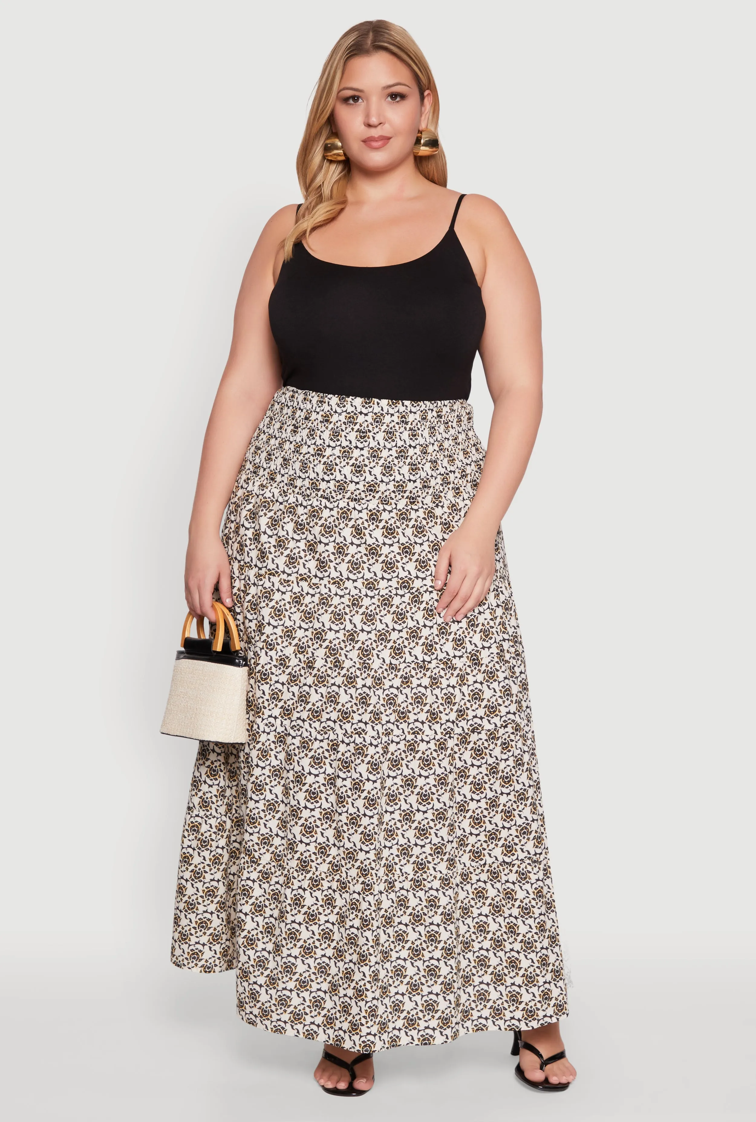 Plus Size Patterned Smocked Waist Maxi Skirt sold by Rainbow