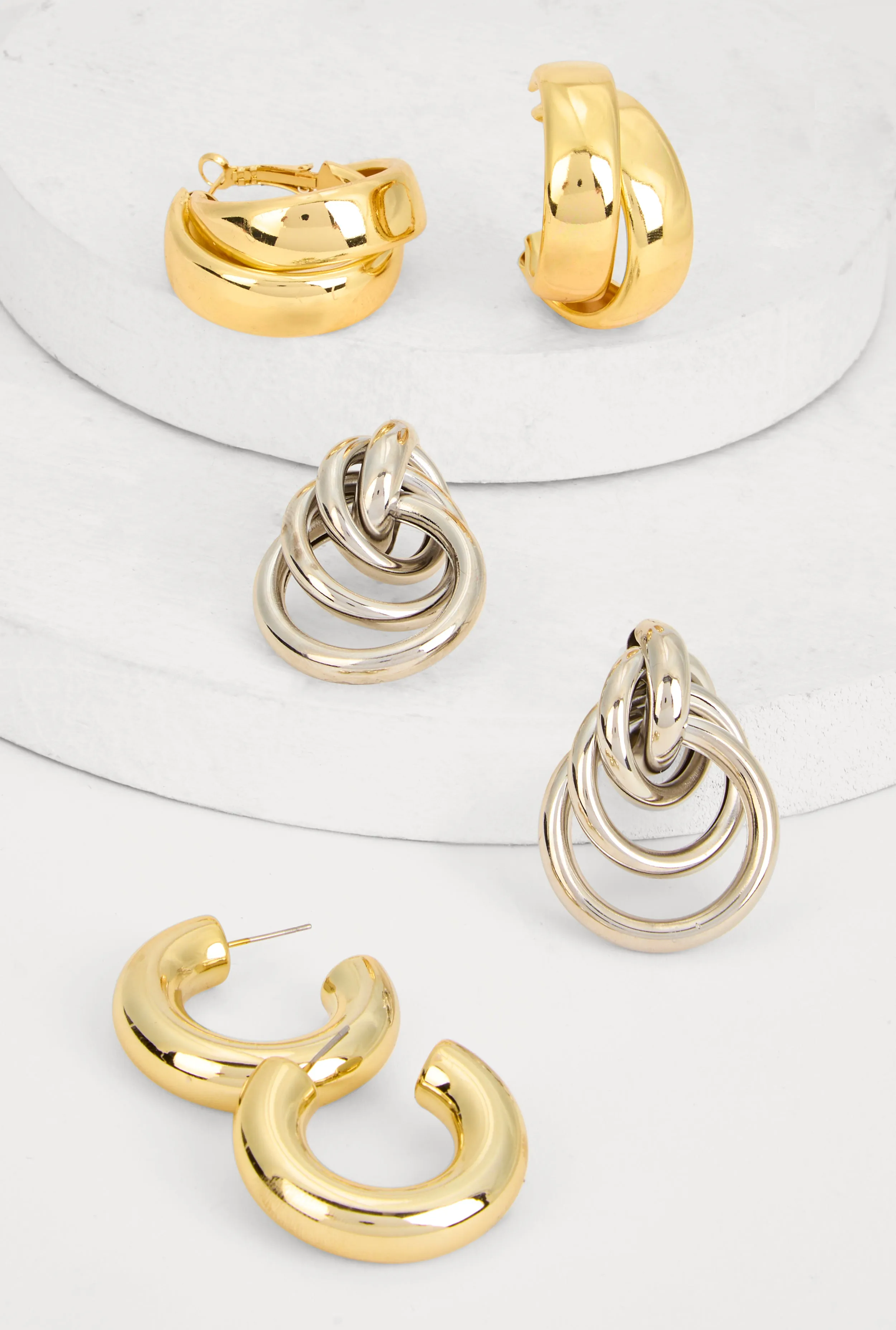 Metallic Hoop and Interlocking Drop Earrings Set of 3 sold by Rainbow