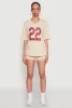 22 V Neck Football T Shirt sold by Rainbow