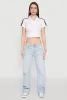 Since 1984 Graphic Cropped Polo Shirt sold by Rainbow