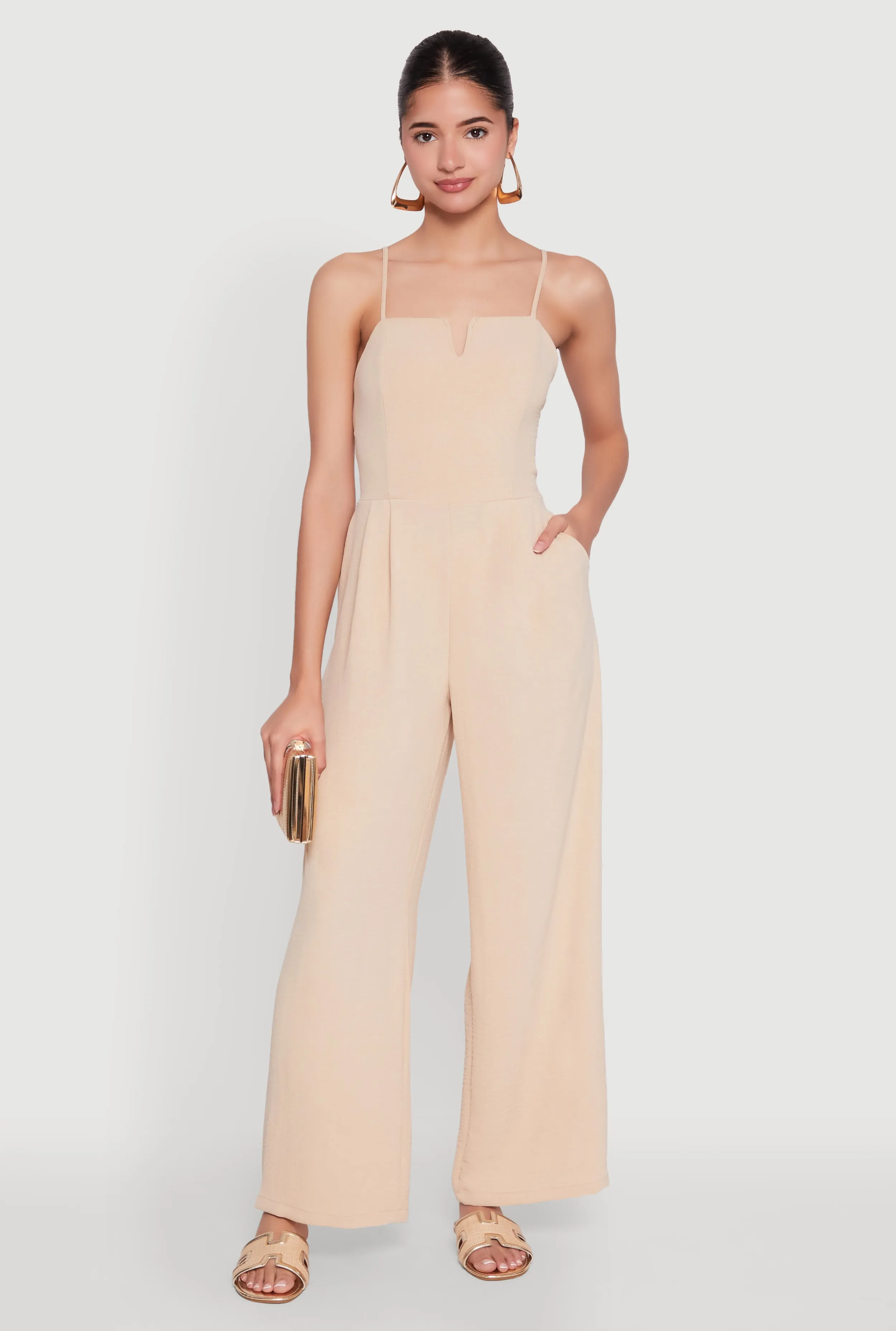Crepe Knit Pleated Jumpsuit sold by Rainbow