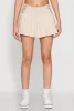 Almost Famous Buckle Detail Gingham Pleated Skort sold by Rainbow