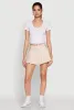 Almost Famous Buckle Detail Gingham Pleated Skort sold by Rainbow