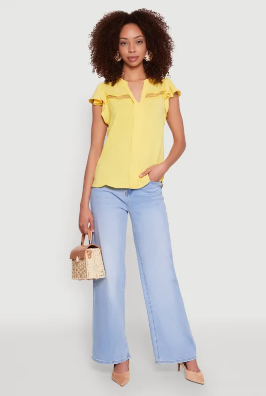 Iris Crepe Knit Flutter Sleeve Blouse sold by Rainbow