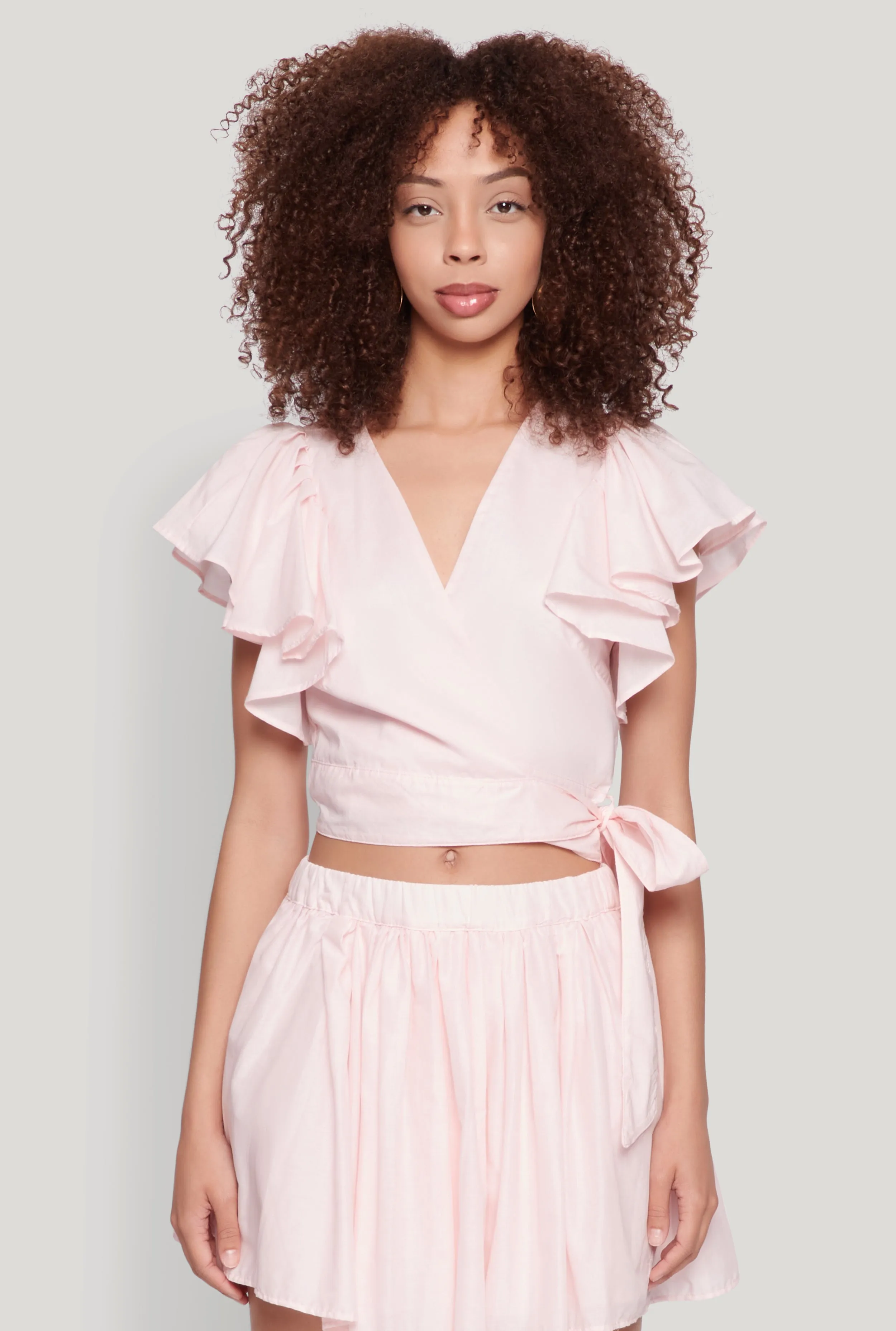 Haute Monde Flutter Sleeve Side Tie Wrap Top sold by Rainbow