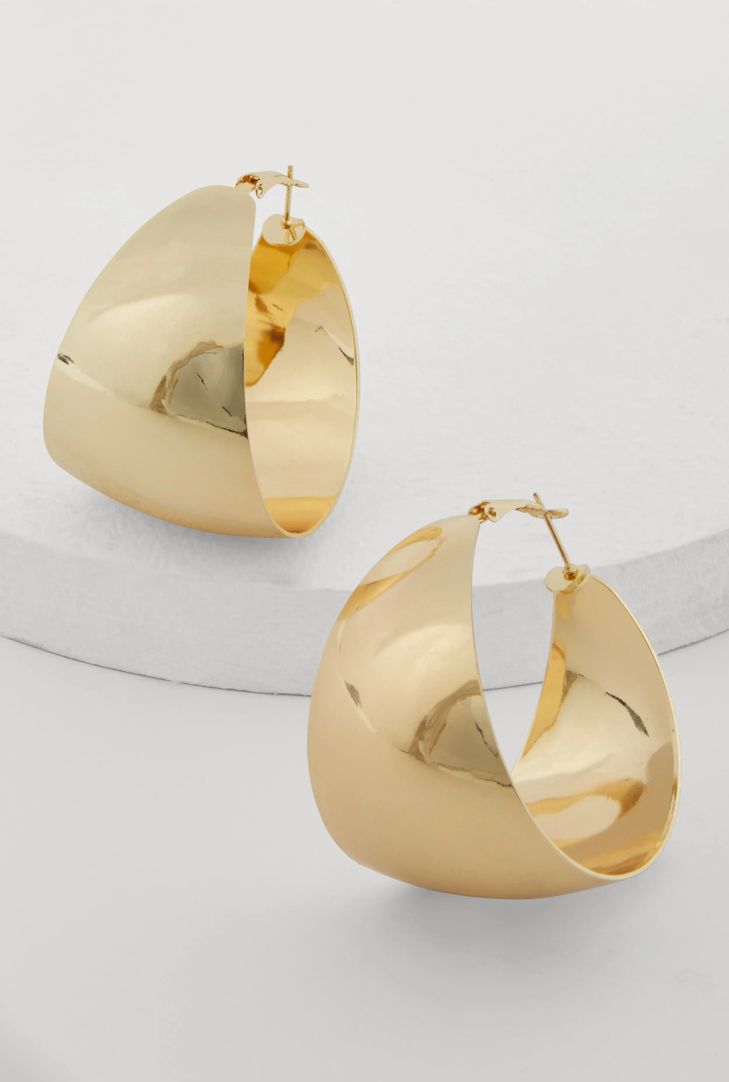 Shiny Metallic Hoop Earrings sold by Rainbow