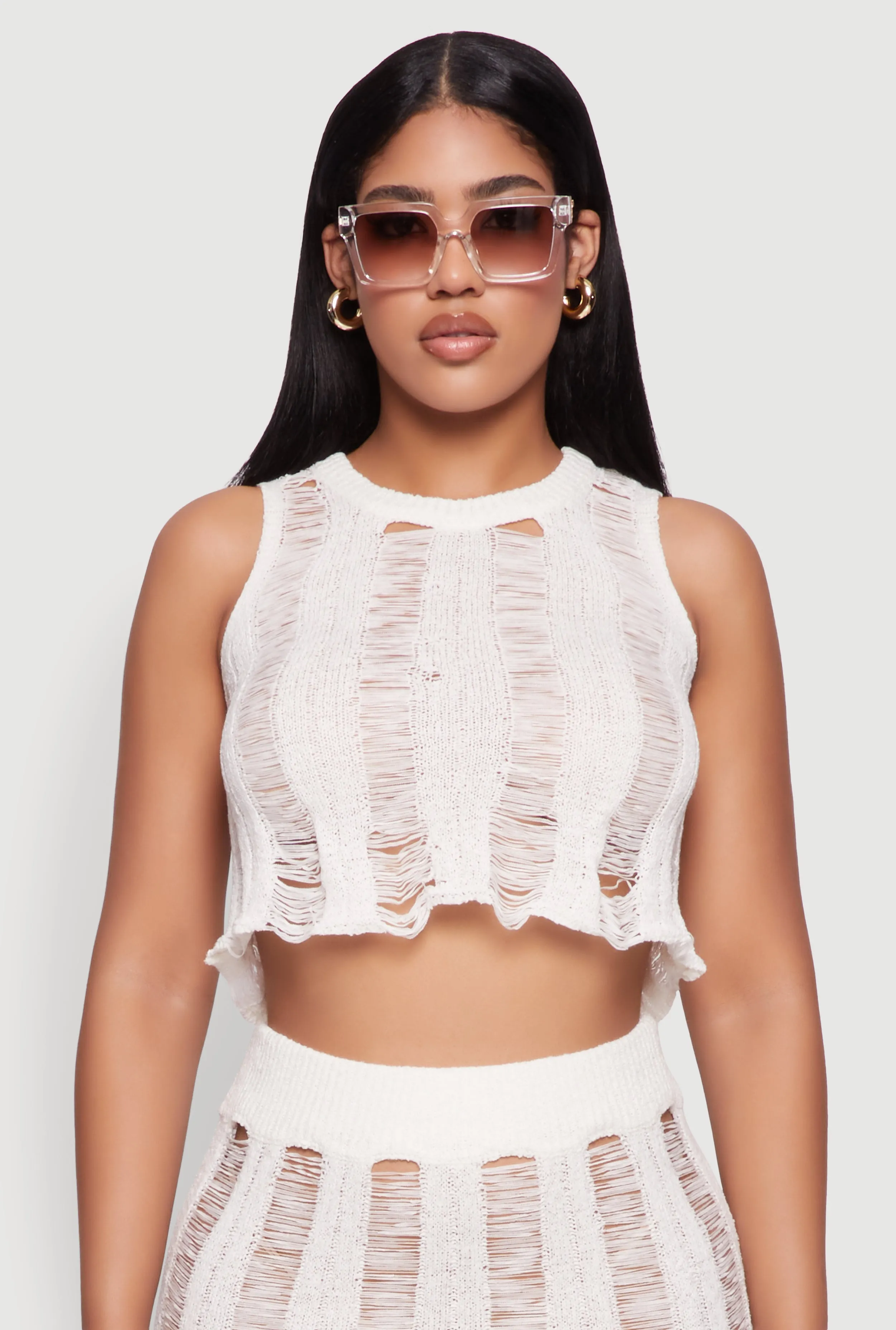 Trendy Sleeveless Distressed Crop Top sold by Rainbow