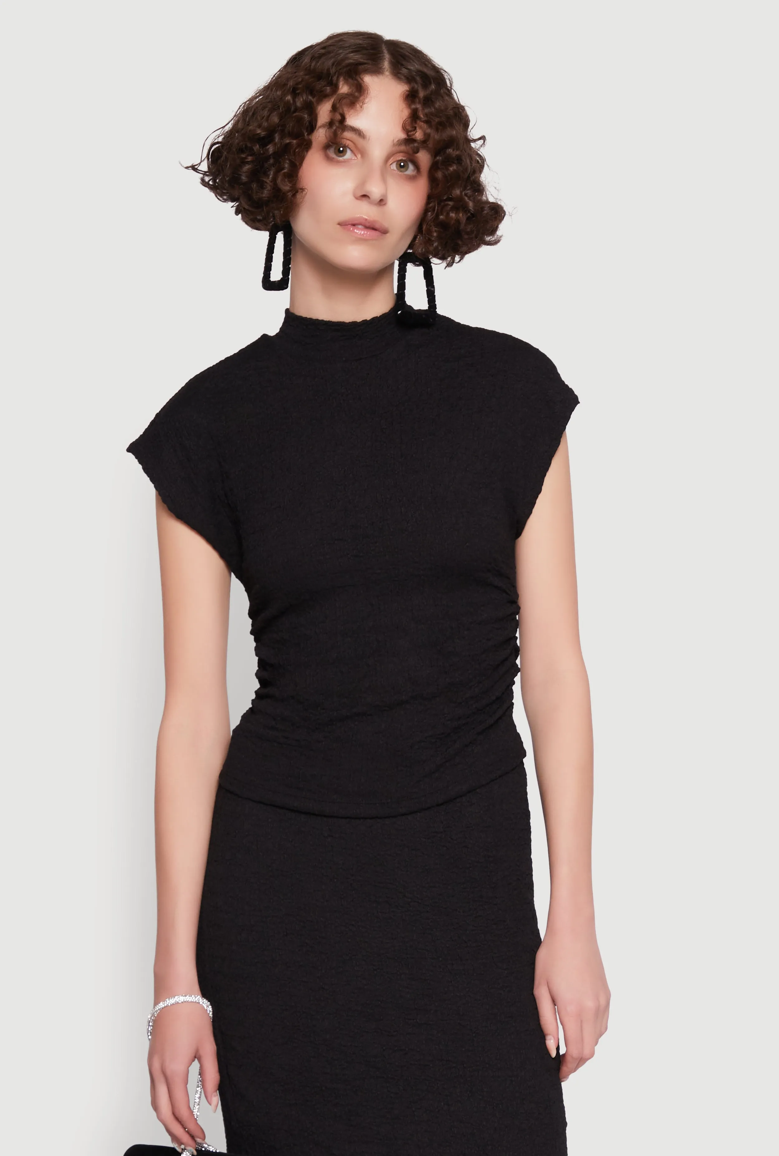 Iris Textured Knit Blouse sold by Rainbow