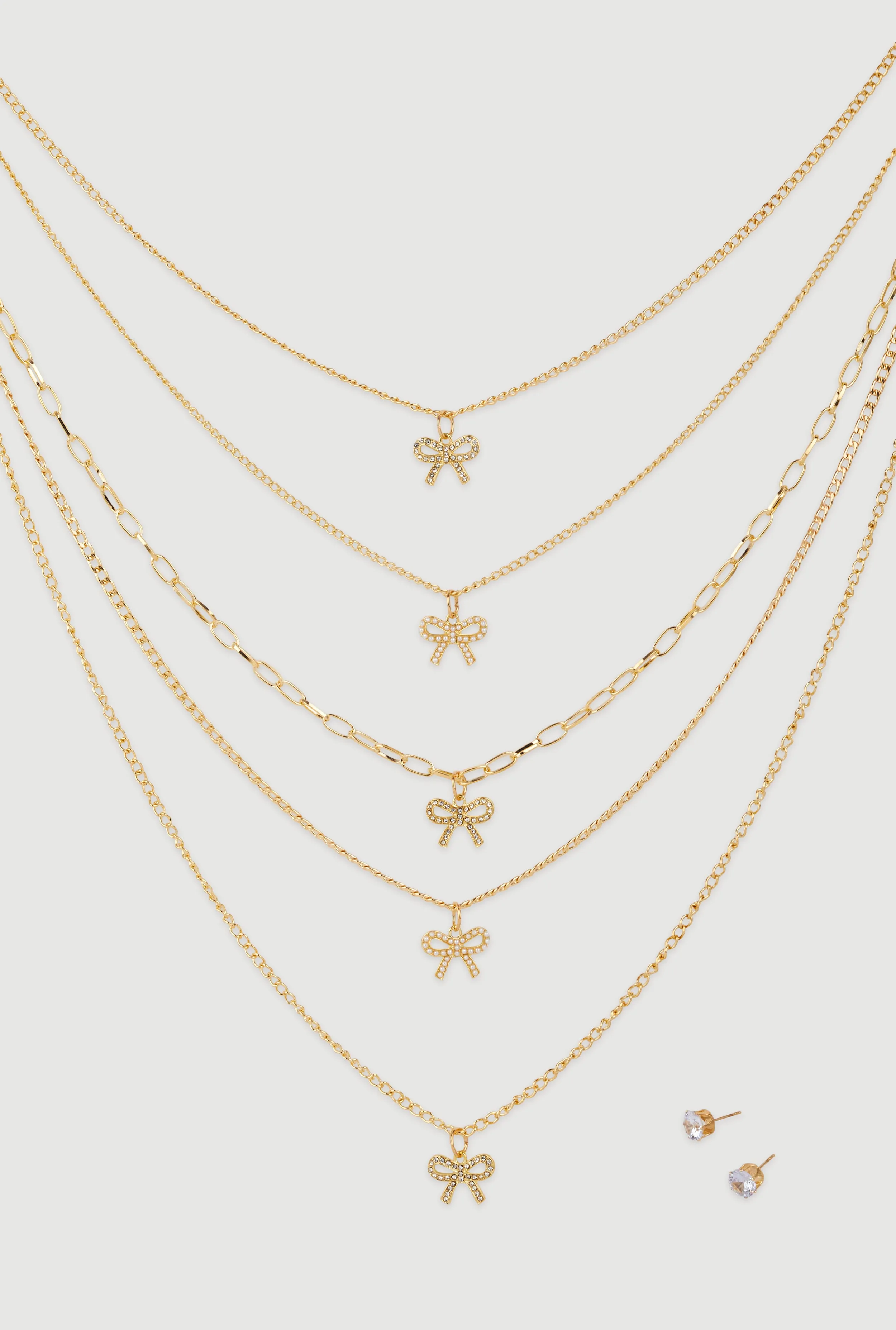 Elegant Cubic Zirconia Bow Detail Layered Necklace Set sold by Rainbow