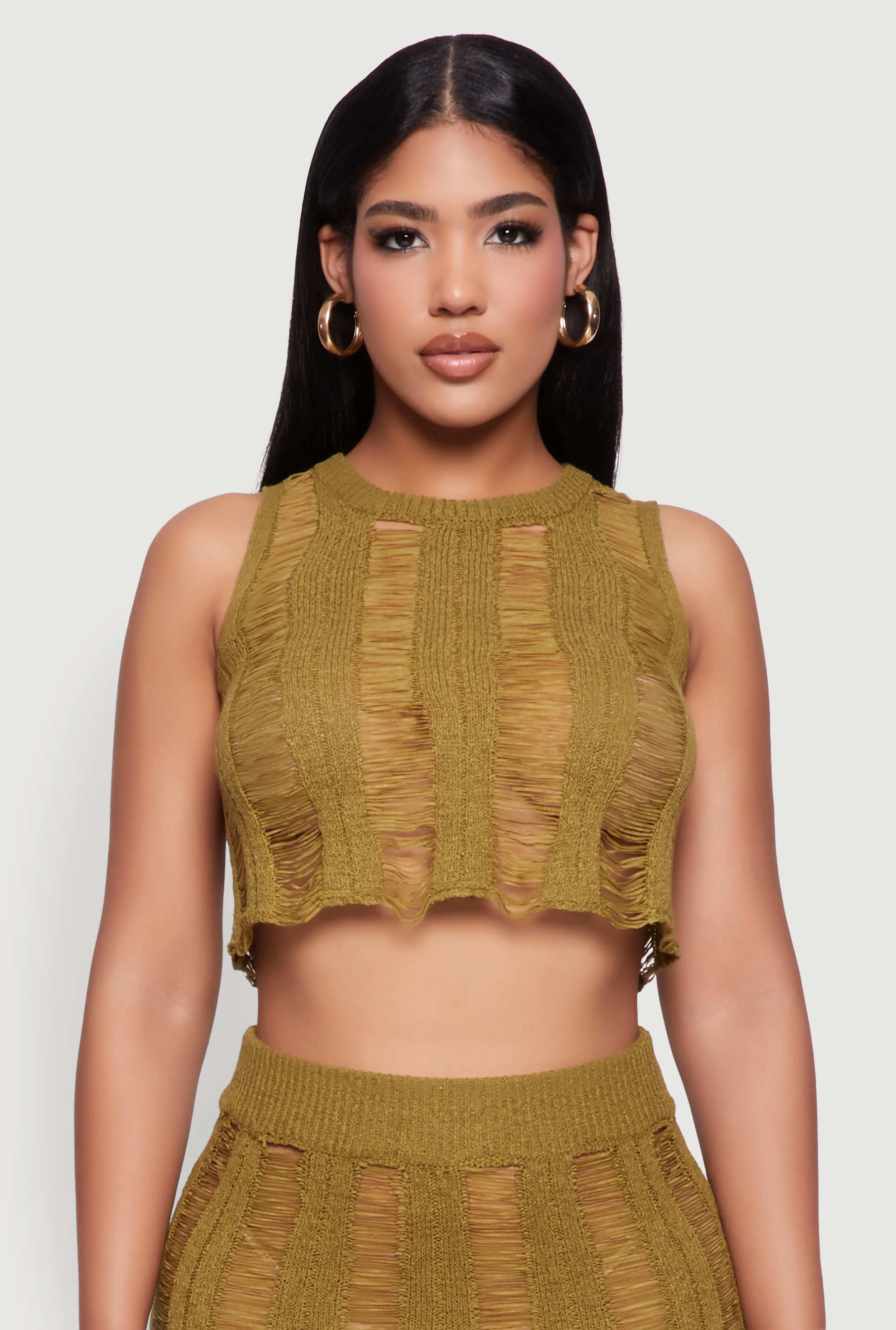 Trendy Sleeveless Distressed Crop Top sold by Rainbow