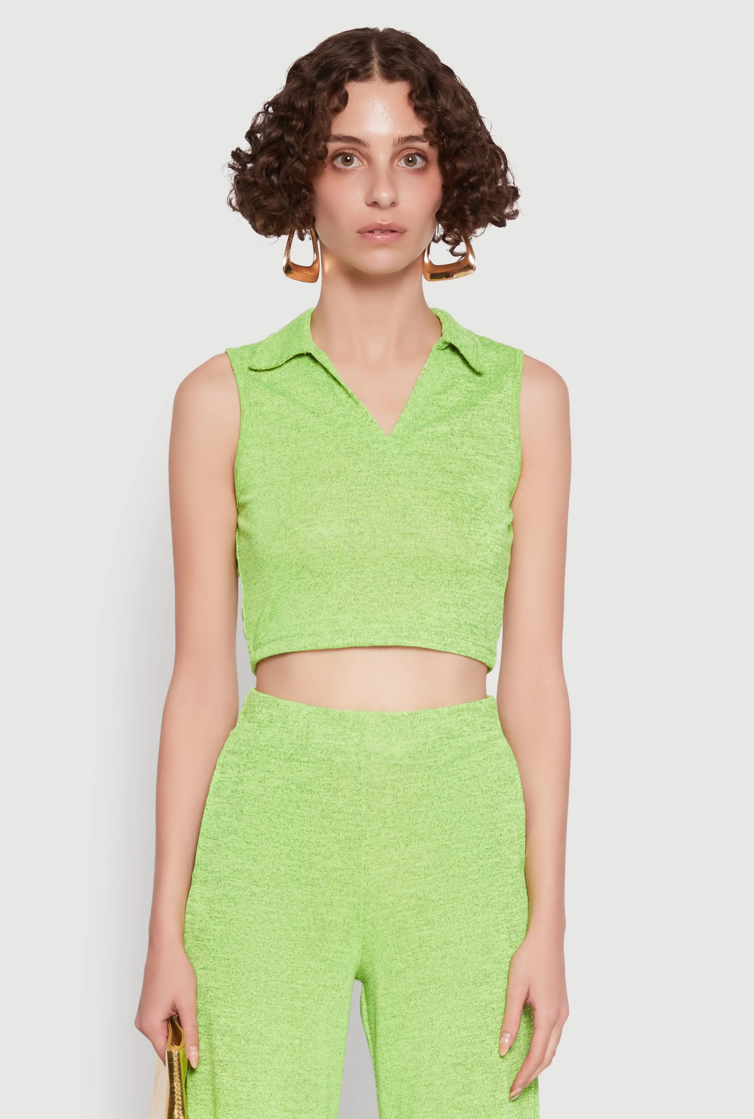 Daisy Sleeveless Collared Crop Top sold by Rainbow