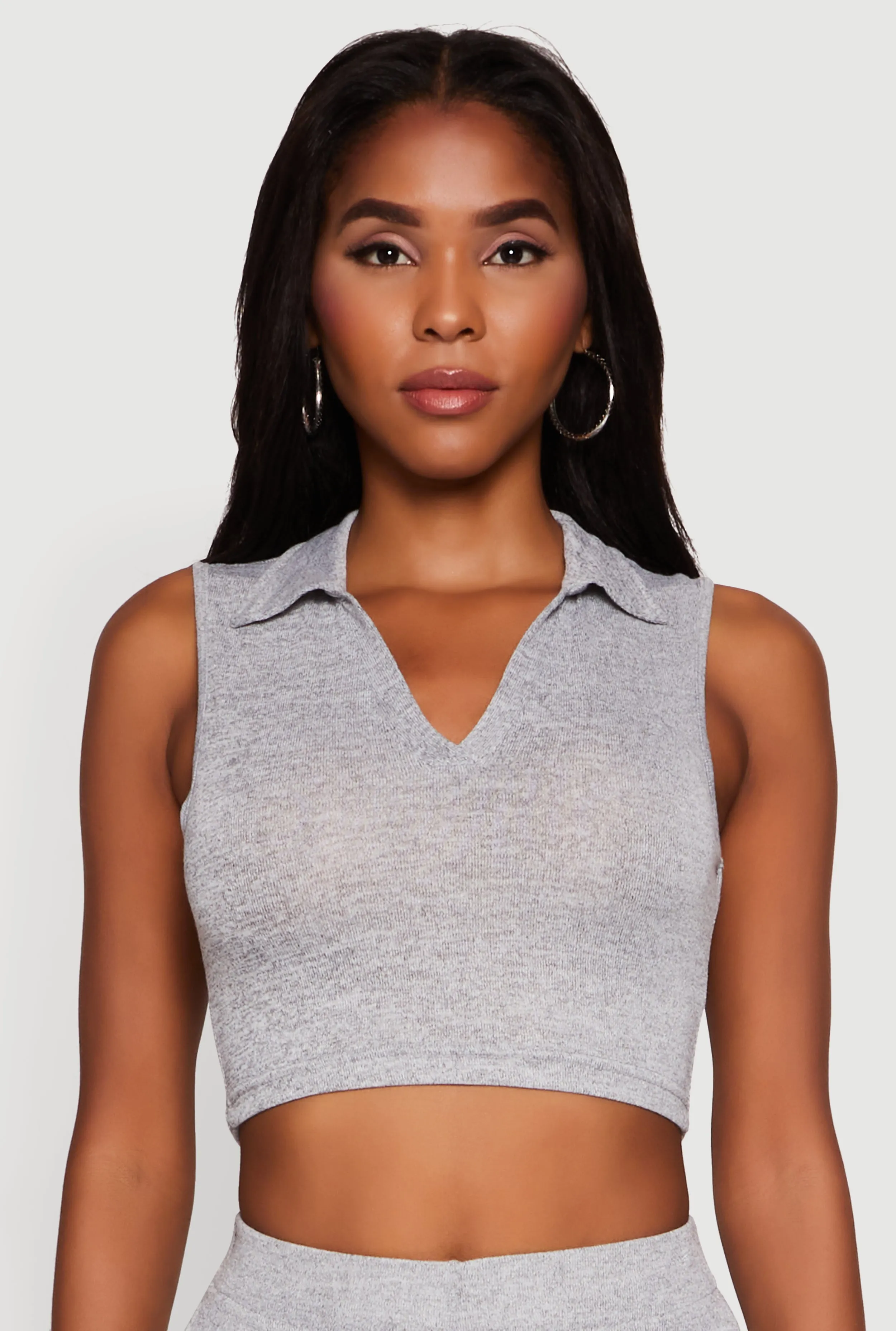 Daisy Sleeveless Collared Crop Top sold by Rainbow