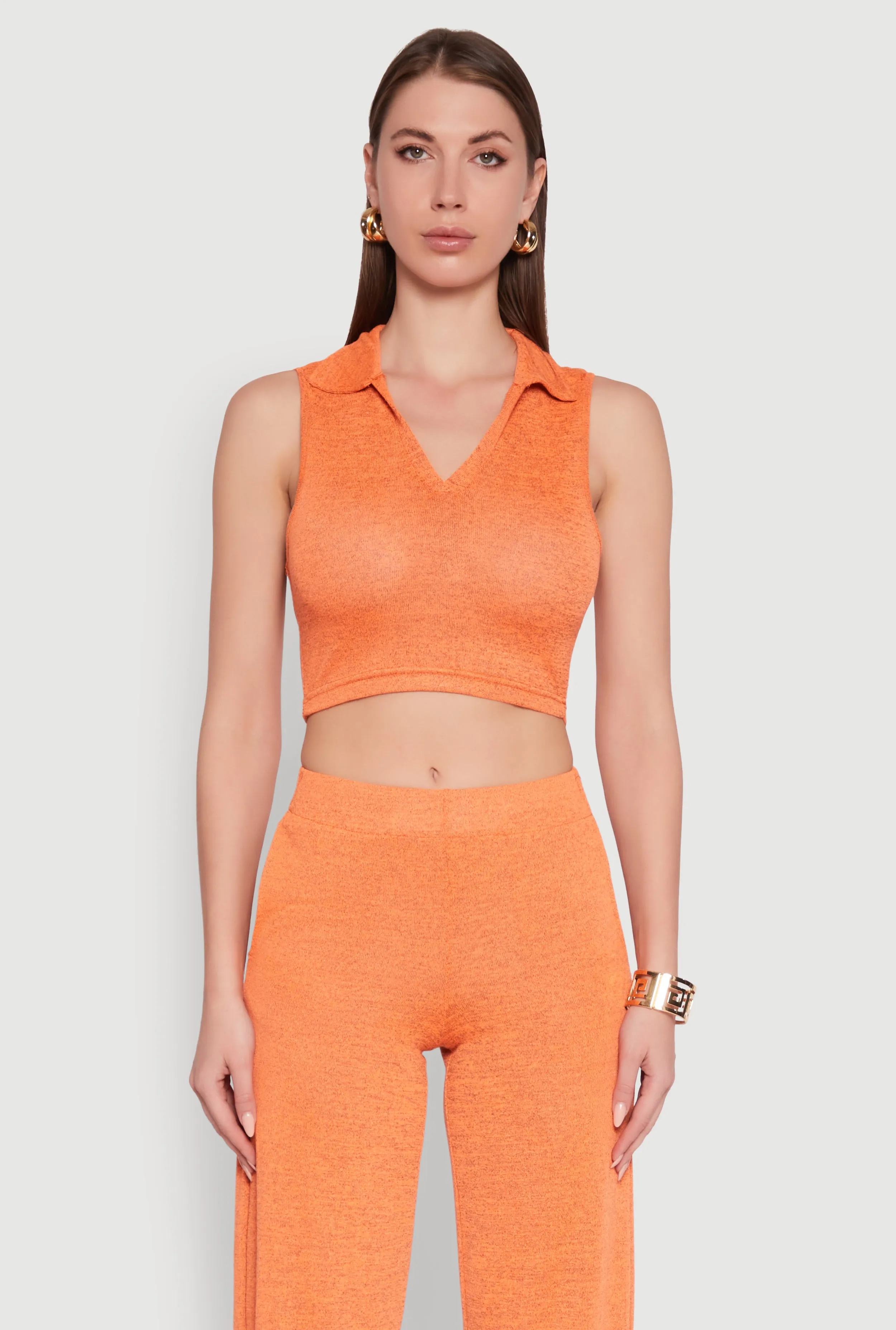 Daisy Sleeveless Collared Crop Top sold by Rainbow