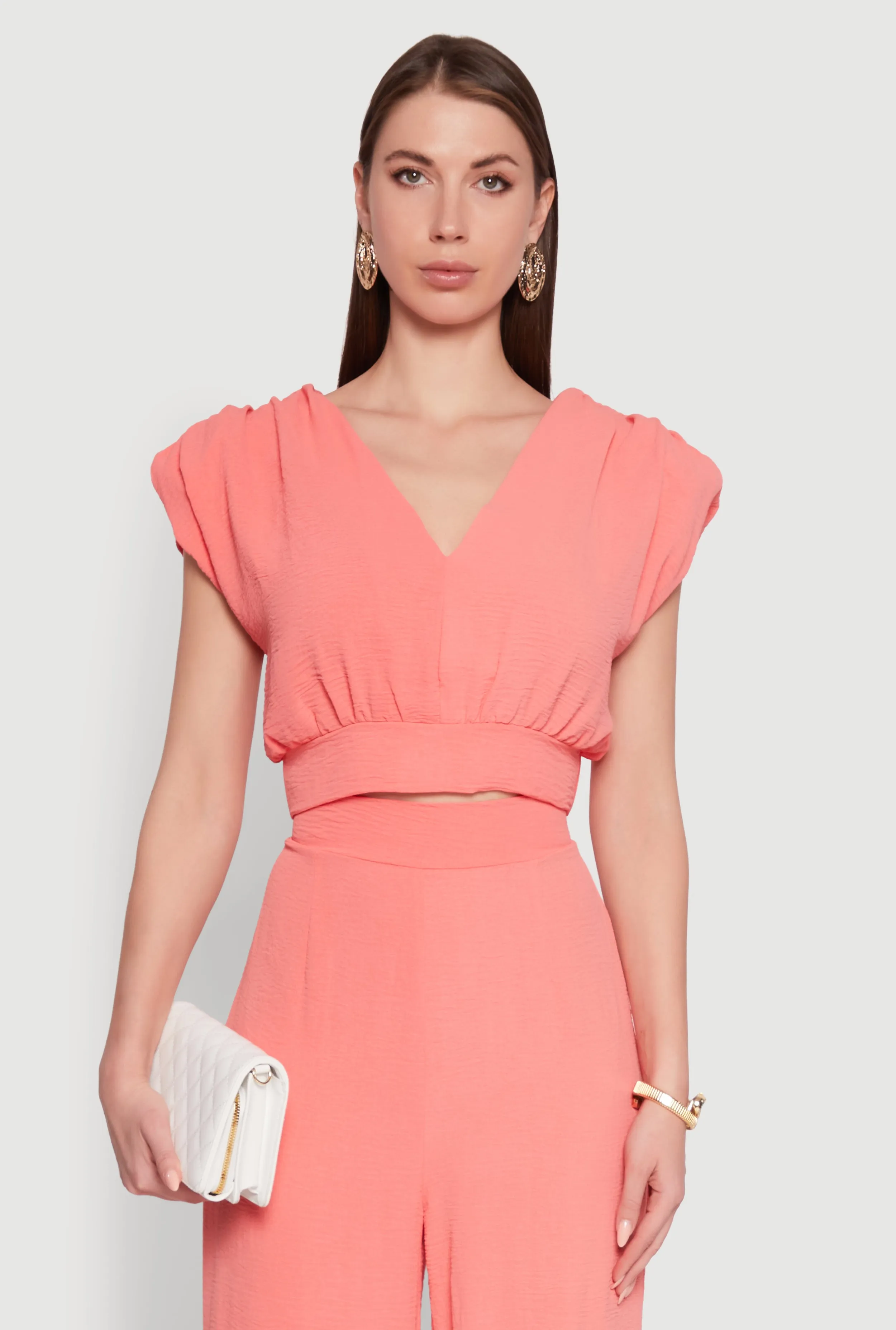 Chic Crepe Knit Blouse with Padded Shoulders and Tie Back sold by Rainbow