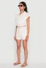 Chic Twill Cropped Jacket with Cargo Pockets and Zippers sold by Rainbow