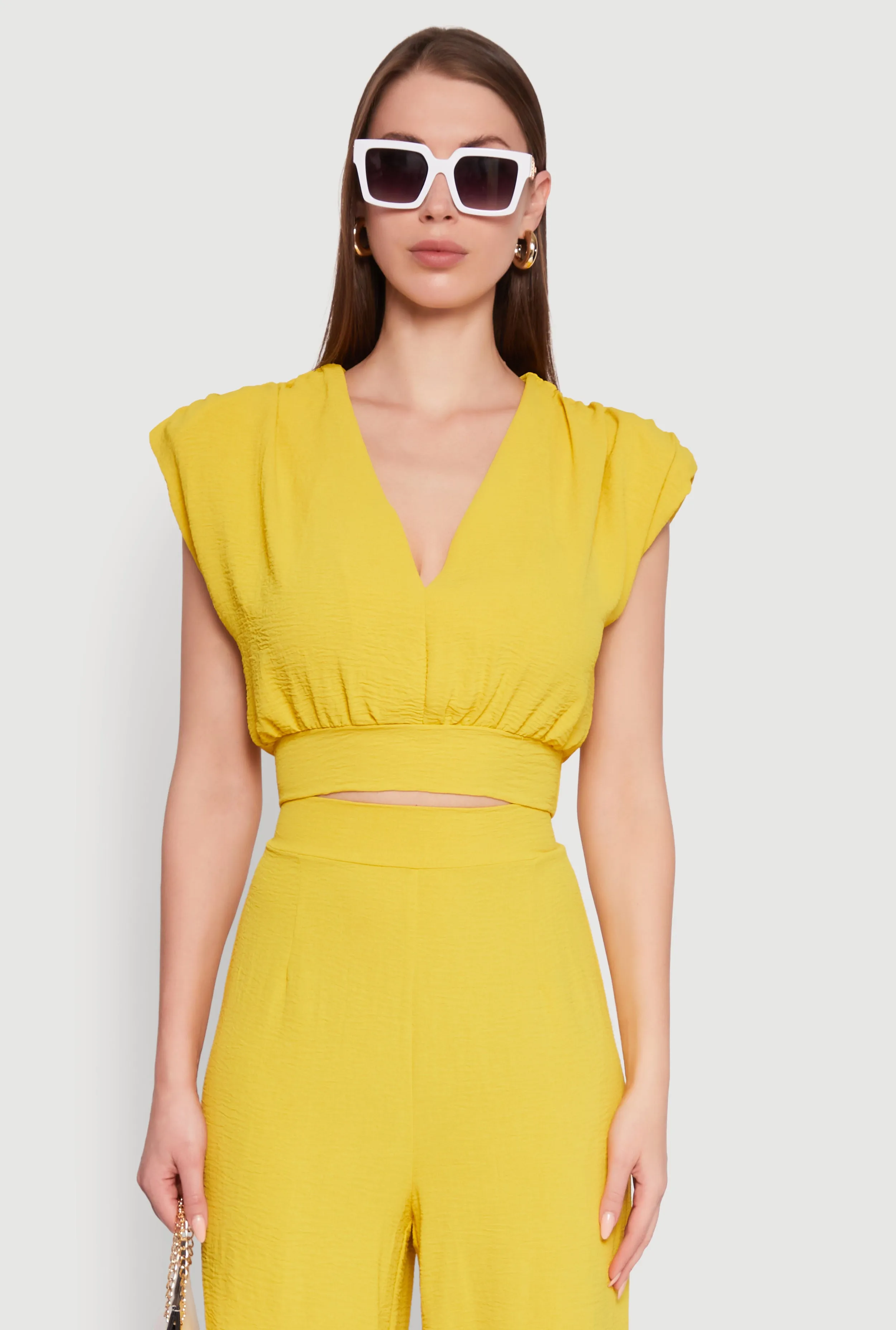 Chic Crepe Knit Blouse with Padded Shoulders and Tie Back sold by Rainbow