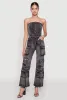 Daisy Denim Strapless Flare Jumpsuit with Cargo Pockets sold by Rainbow