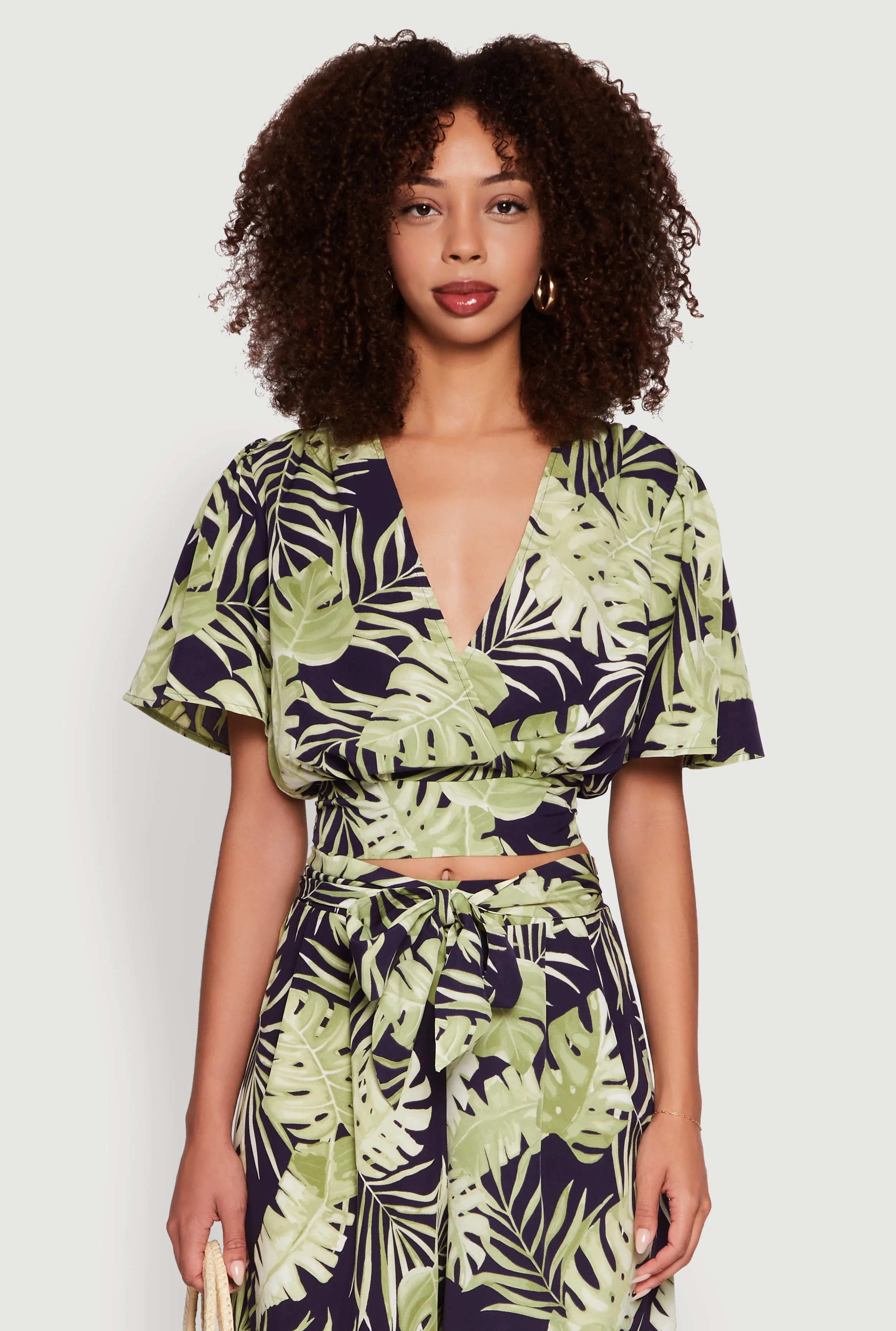 Iris Tropical Leaf Print Faux Wrap Top sold by Rainbow