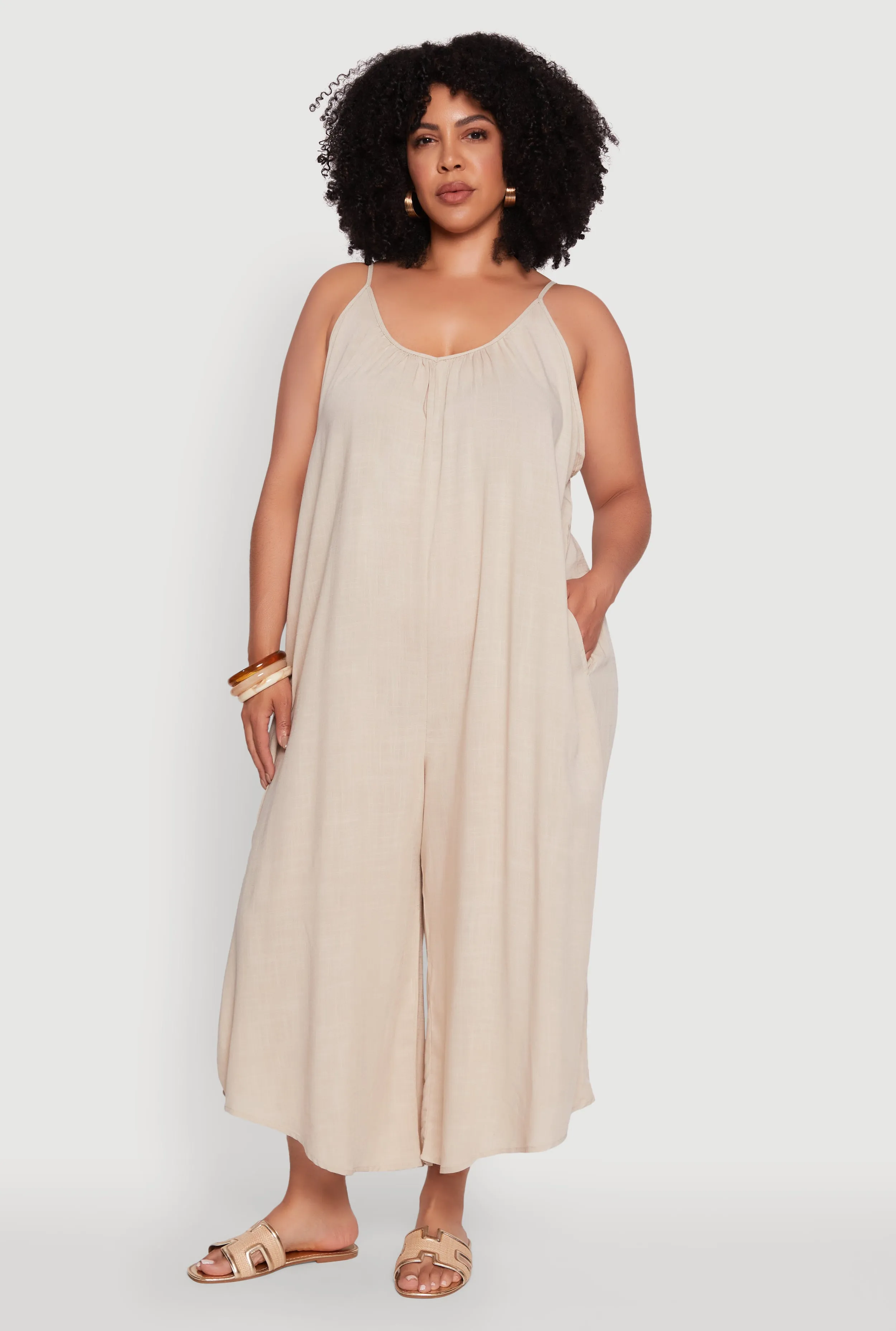 Plus Size V-Neck Wide Leg Jumpsuit sold by Rainbow