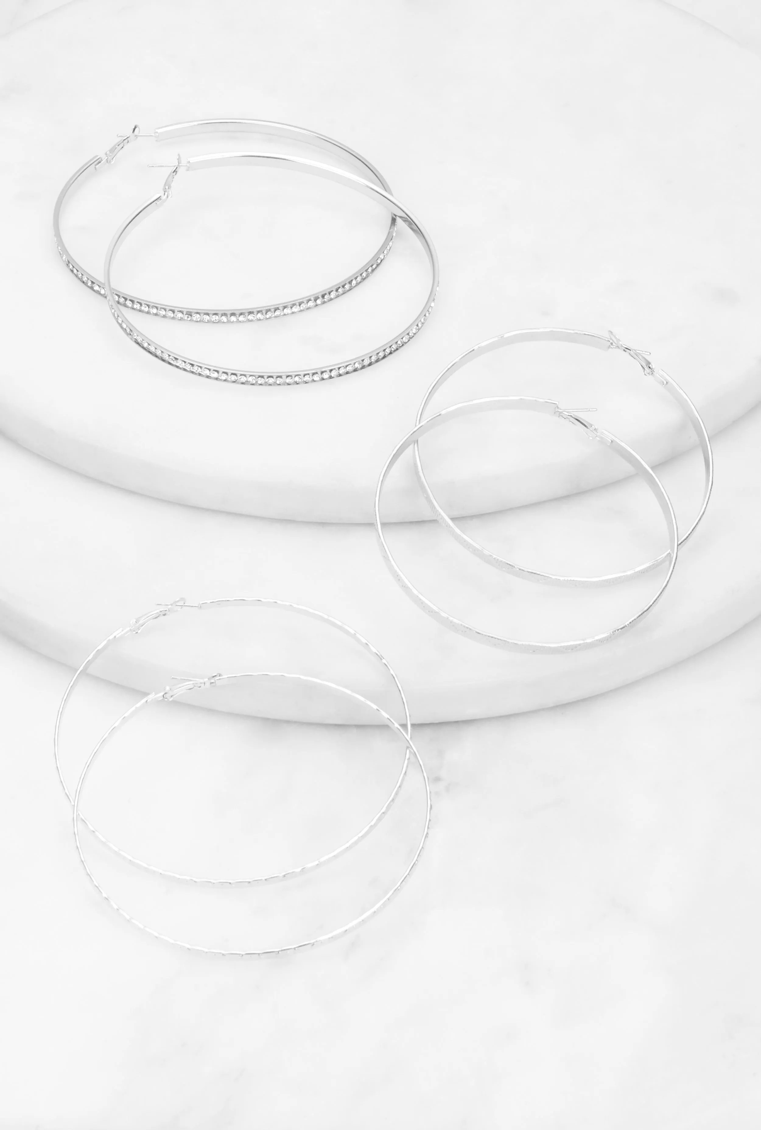 Jumbo Rhinestone Hoop Earring Trio sold by Rainbow