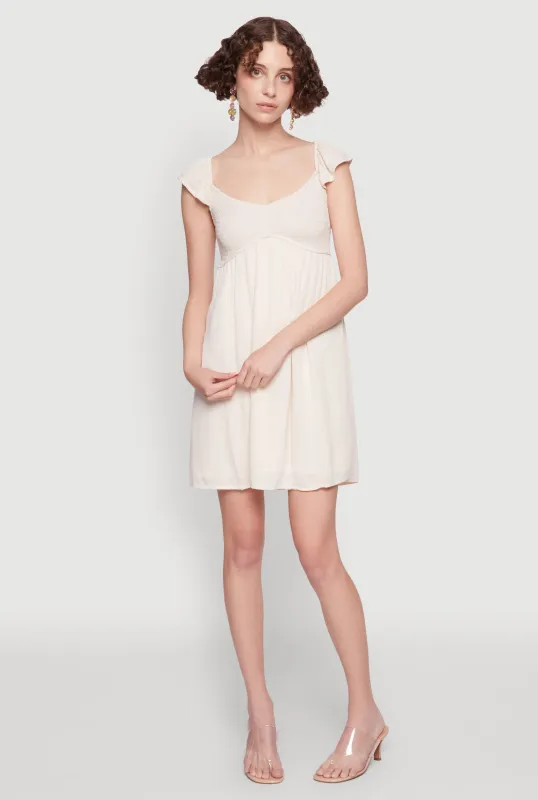 Smocked Flutter Sleeve Empire Waist Mini Dress sold by Rainbow