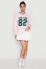 Almost Famous Varsity Graphic Long Sleeve Top sold by Rainbow
