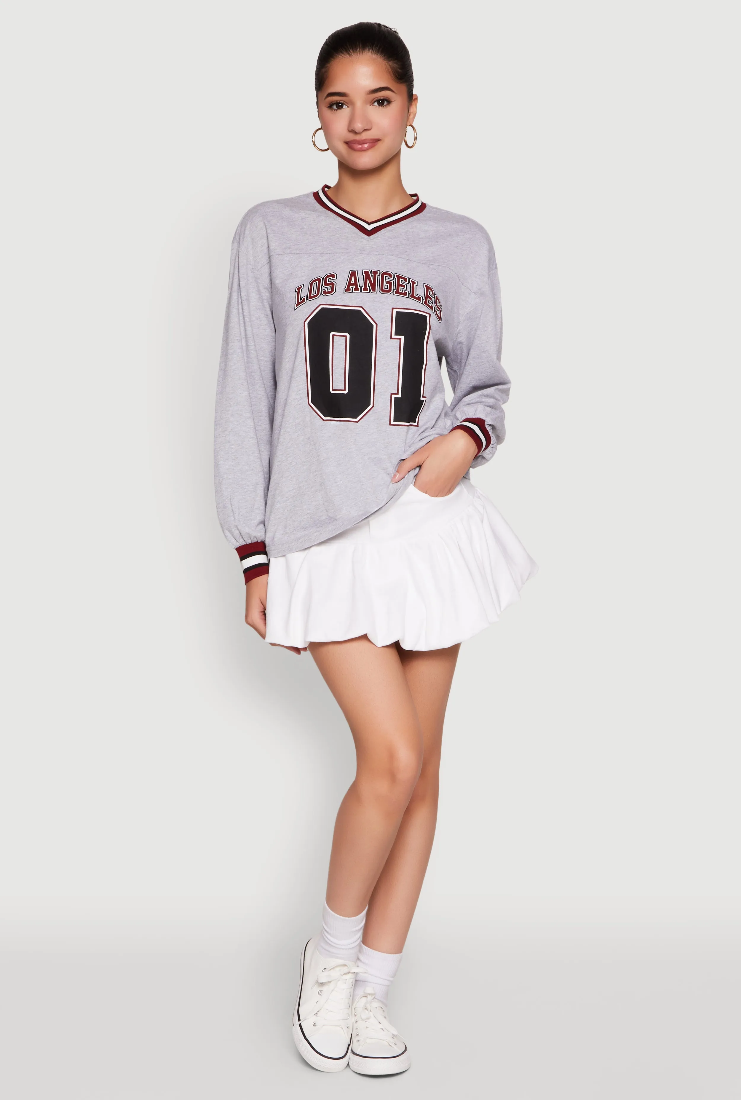 Almost Famous Varsity Graphic Long Sleeve Top sold by Rainbow