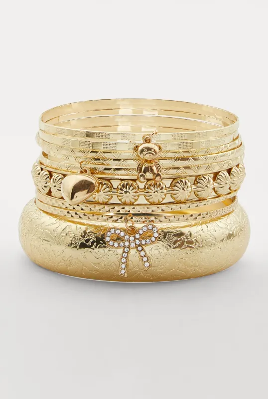 Assorted Metallic Rhinestone Bow Charm Bangles Set of 9 sold by Rainbow