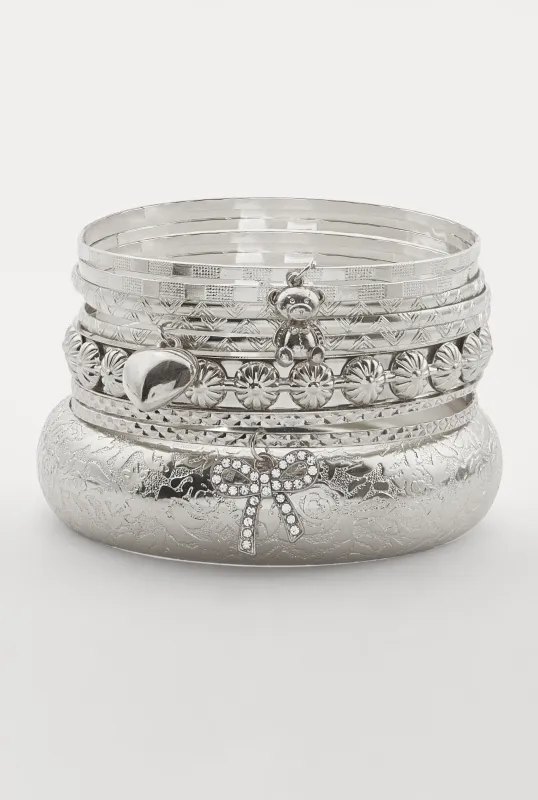 Assorted Metallic Rhinestone Bow Charm Bangles Set of 9 sold by Rainbow