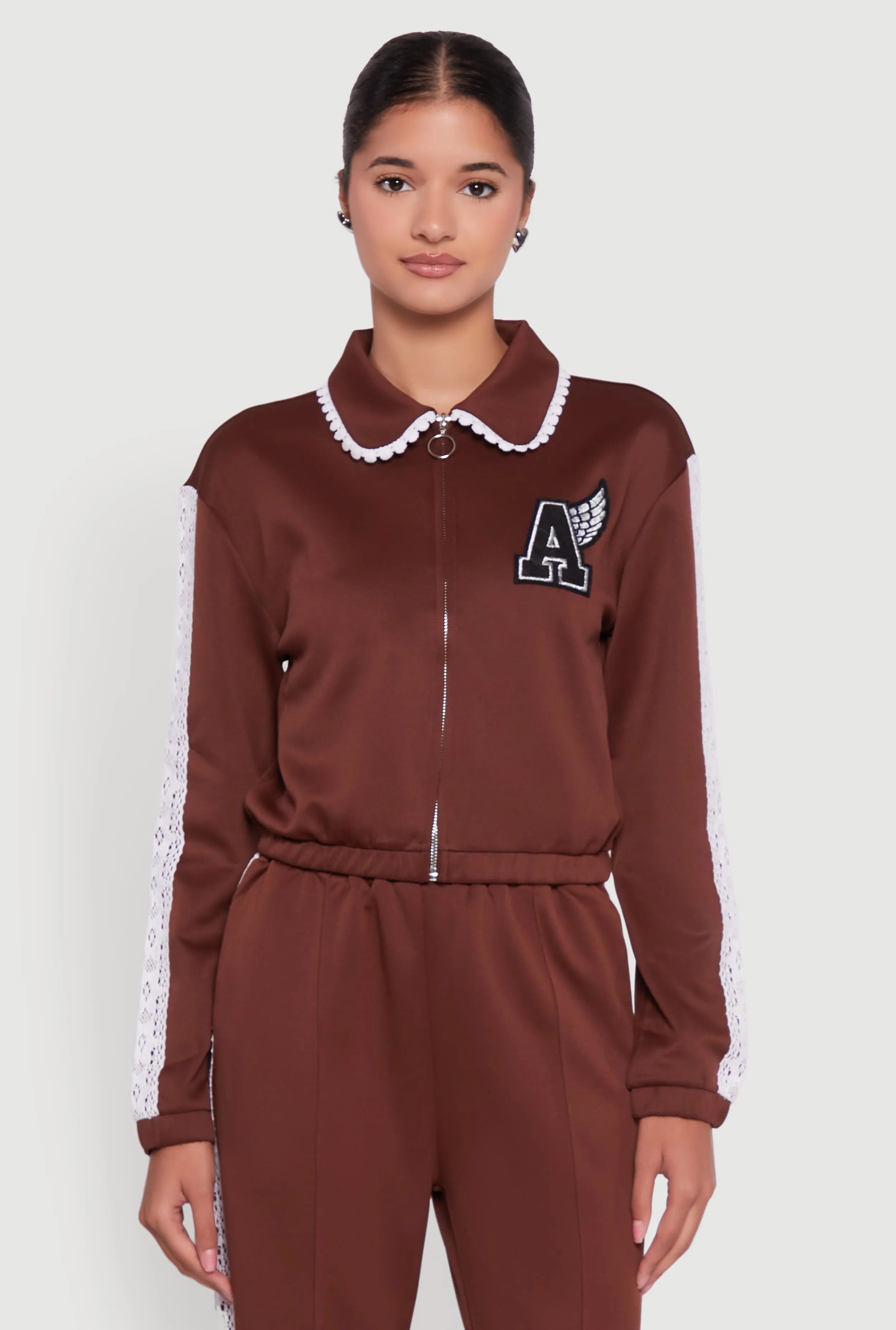 Collared Crochet Trim Graphic Track Jacket sold by Rainbow