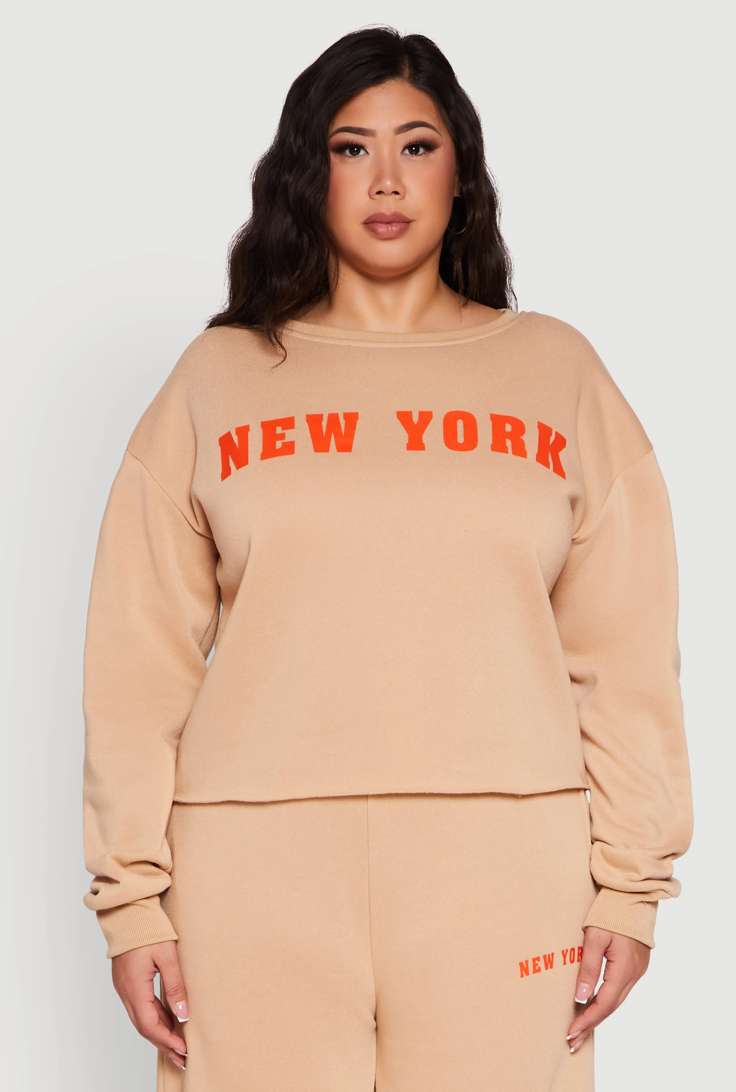 Plus Size New York Graphic Raw Hem Sweatshirt sold by Rainbow