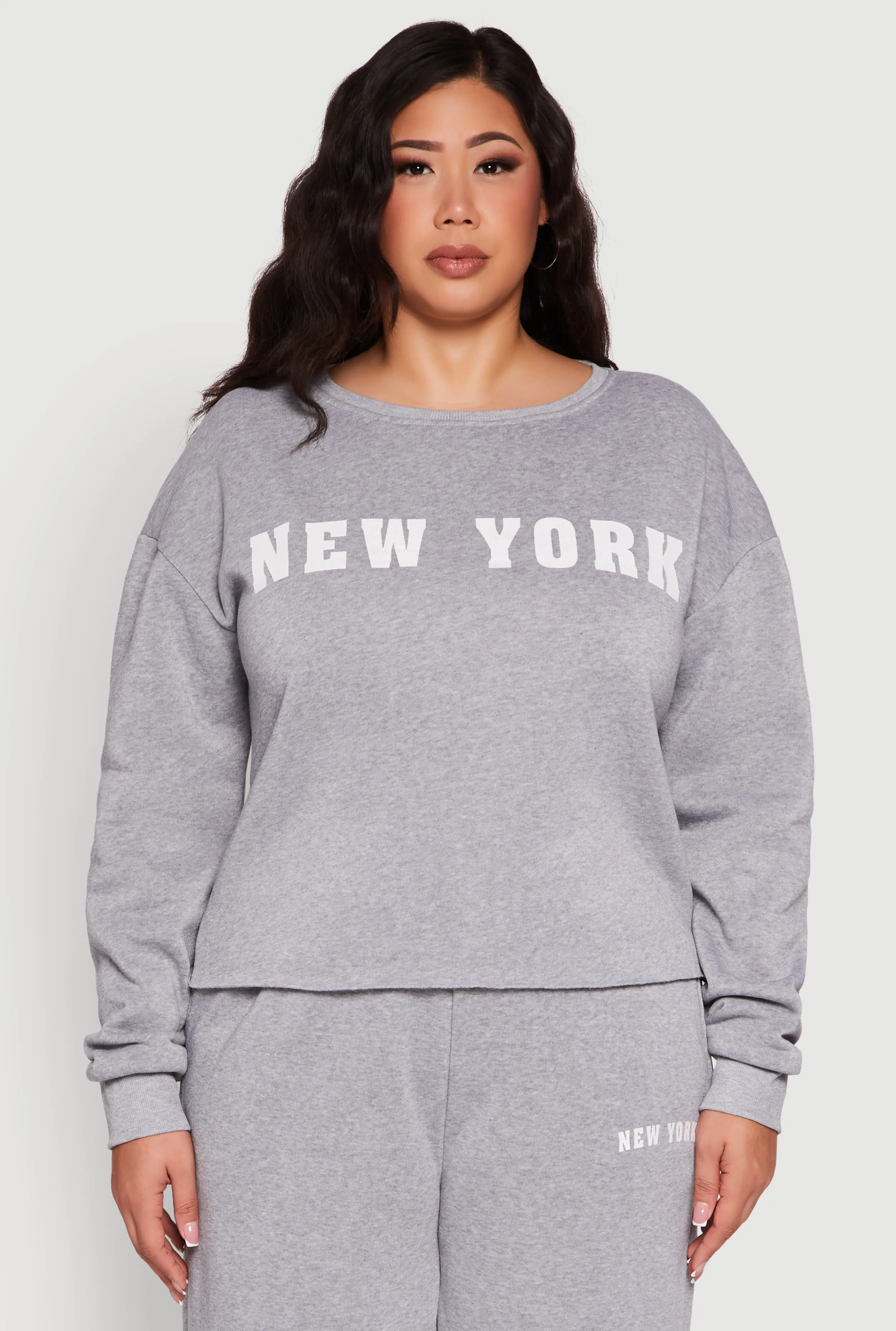 Plus Size New York Graphic Raw Hem Sweatshirt sold by Rainbow