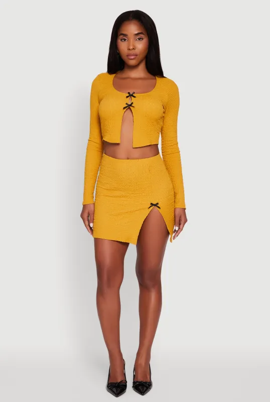 Textured Knit Bow Detail Side Slit Mini Skirt sold by Rainbow