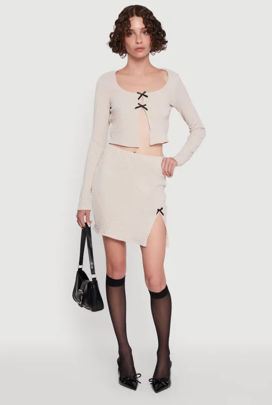 Textured Knit Bow Detail Side Slit Mini Skirt sold by Rainbow