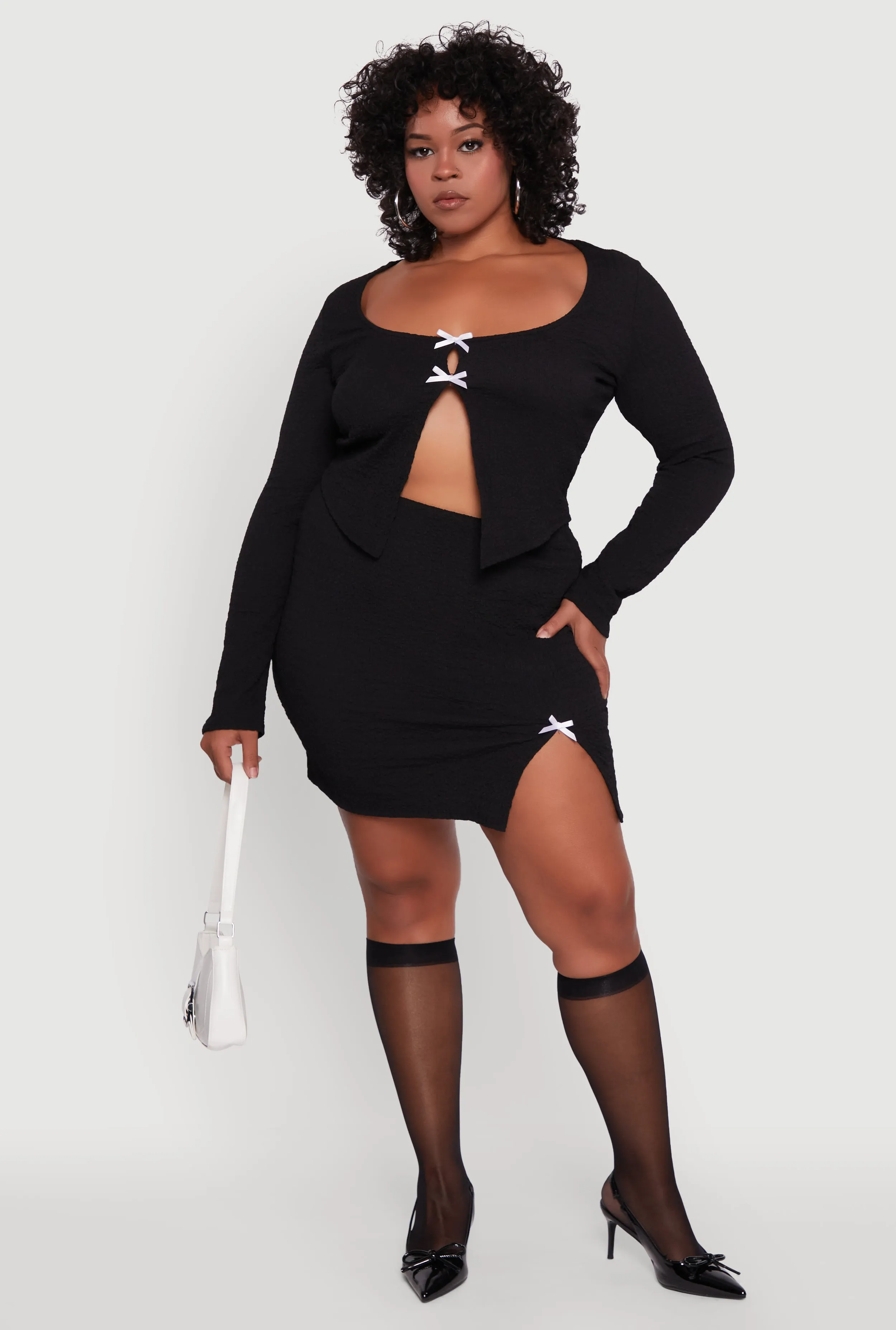 Plus Size High Waisted Side Slit Bow Detail Mini Skirt sold by Rainbow