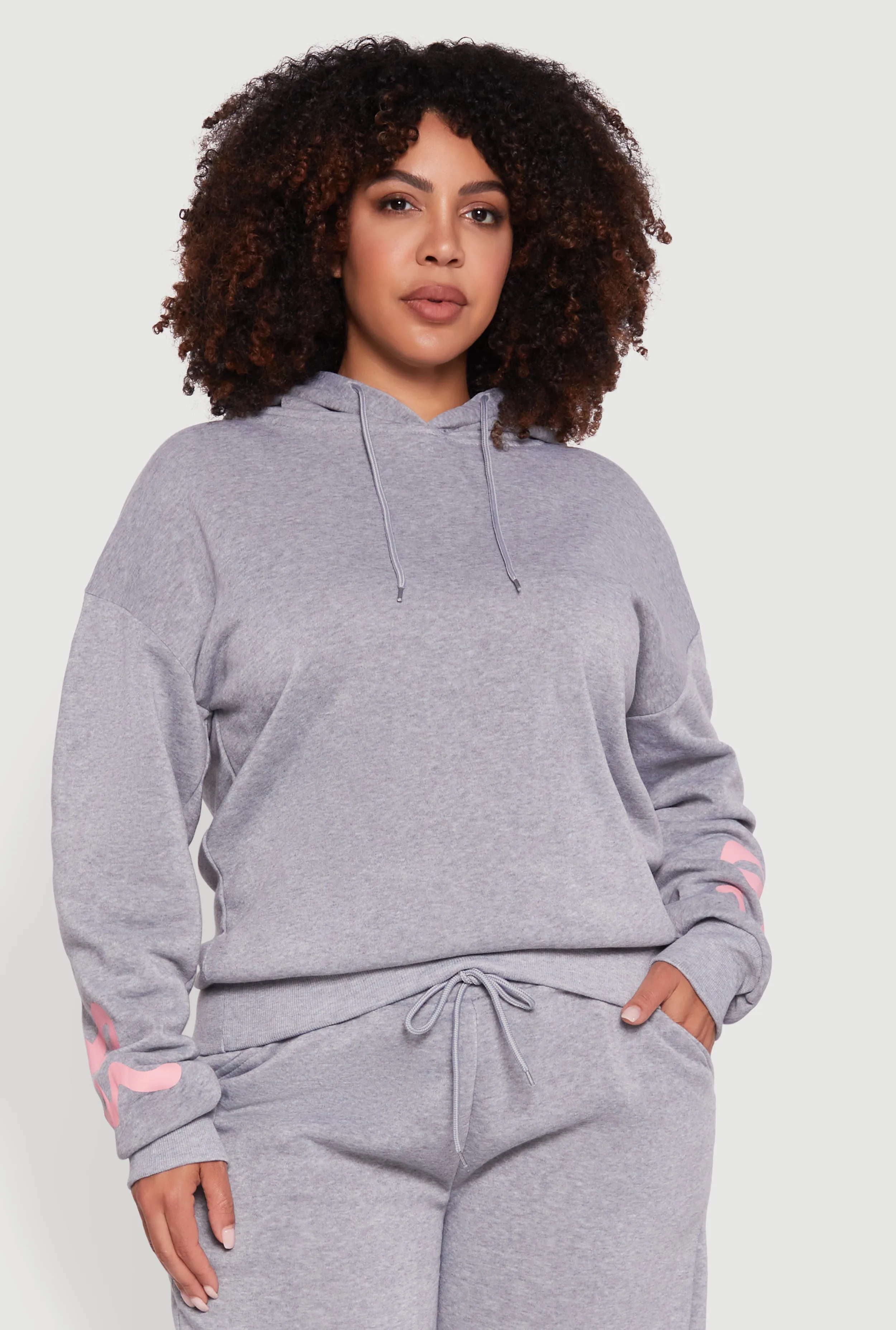 Plus Size Fleece Pullover Hoodie with Bow Graphic Detail sold by Rainbow