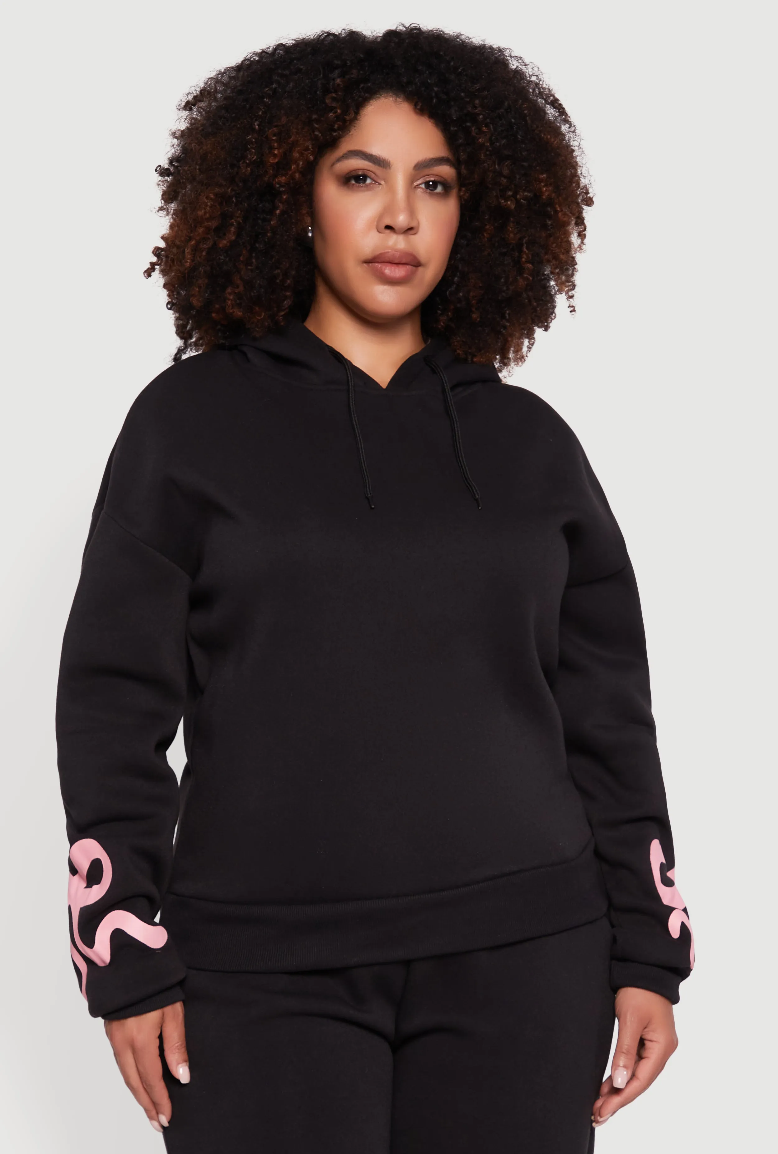Plus Size Fleece Pullover Hoodie with Bow Graphic Detail sold by Rainbow