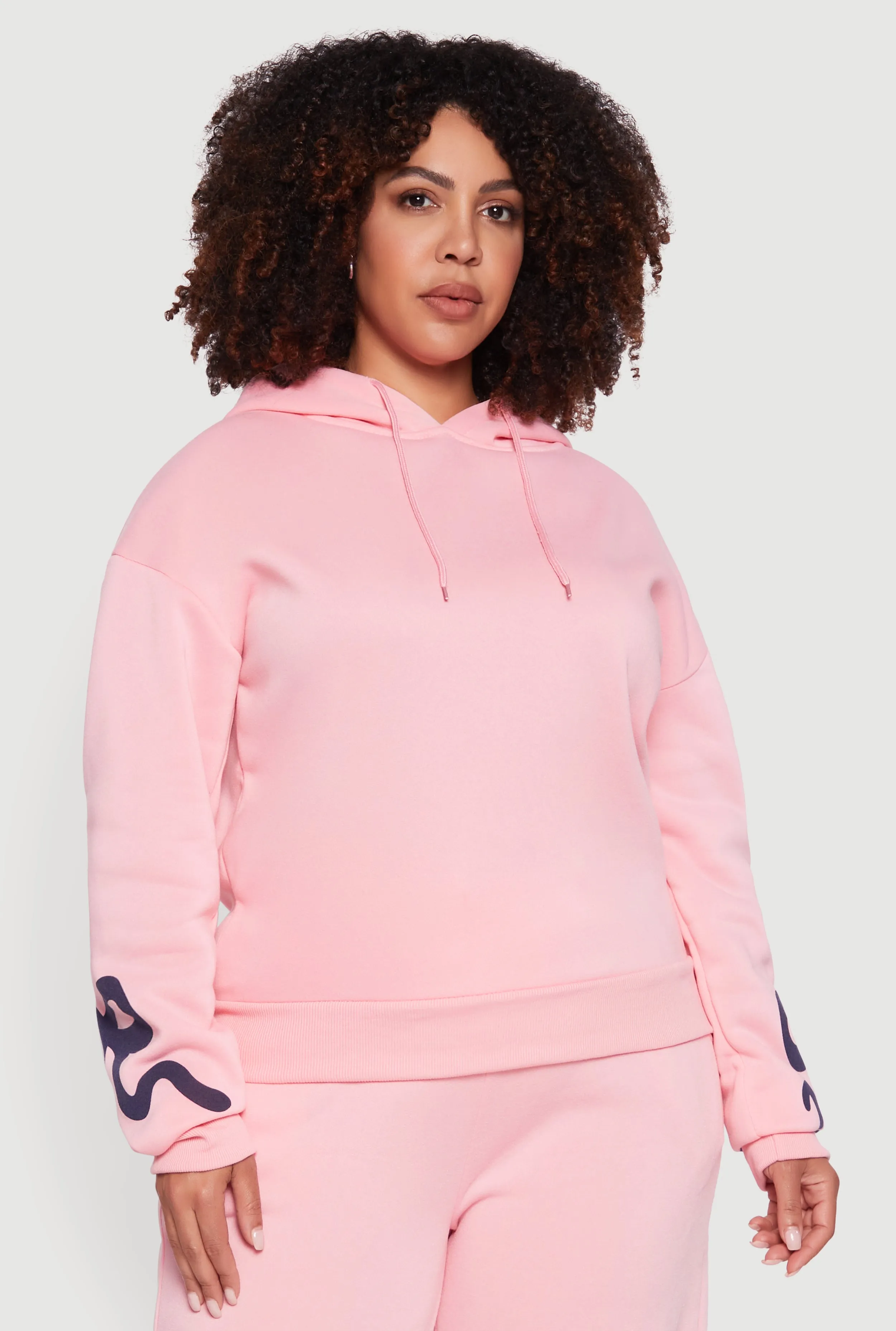 Plus Size Fleece Pullover Hoodie with Bow Graphic Detail sold by Rainbow