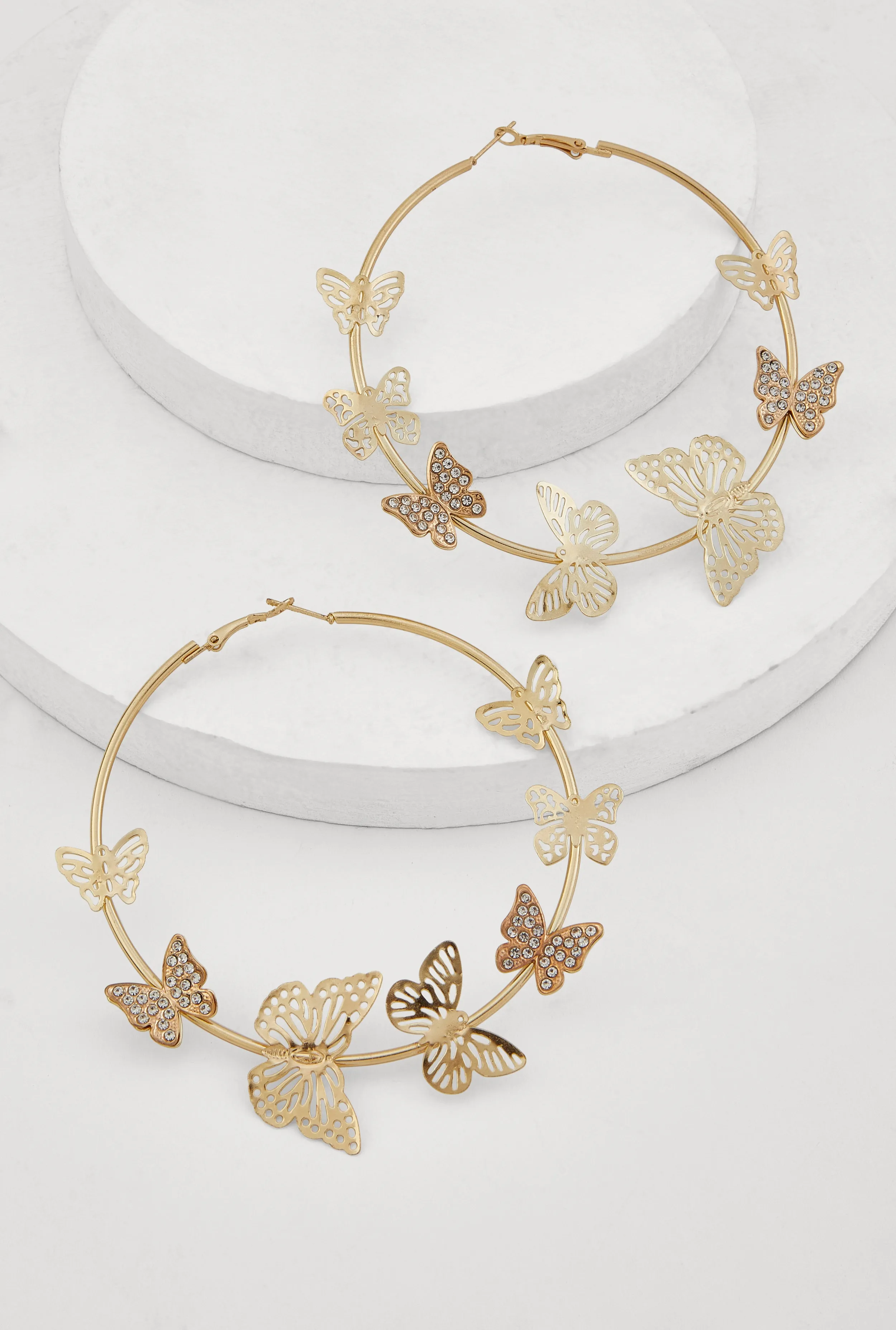Metallic Butterfly Hoop Earrings sold by Rainbow