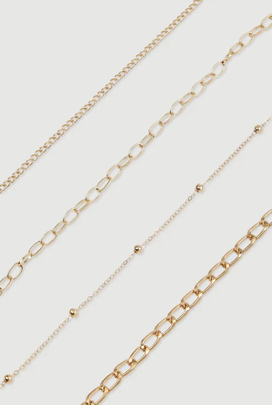Metallic Chain Anklets Set of 4 sold by Rainbow